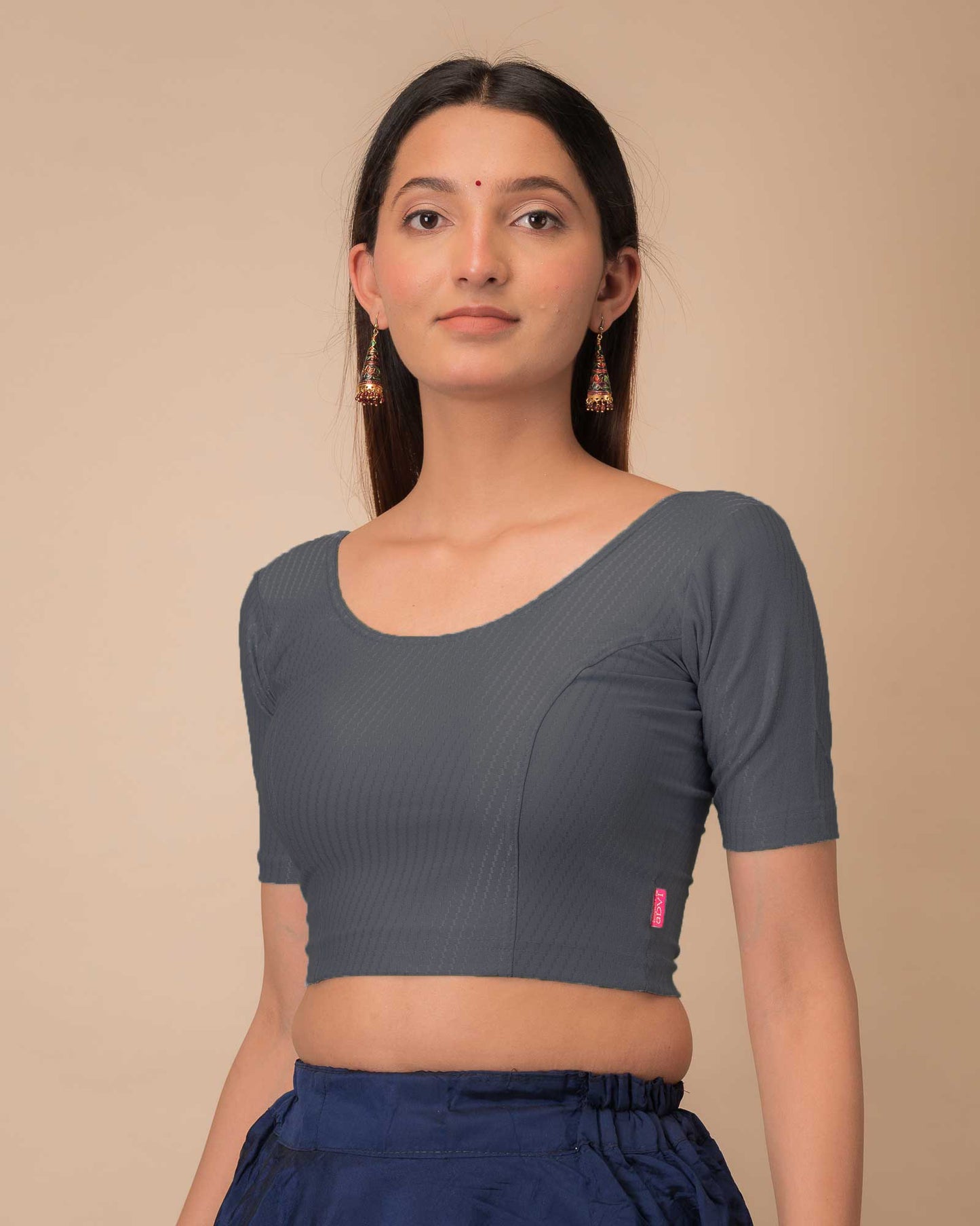 Side profile highlighting sleeve length and silhouette