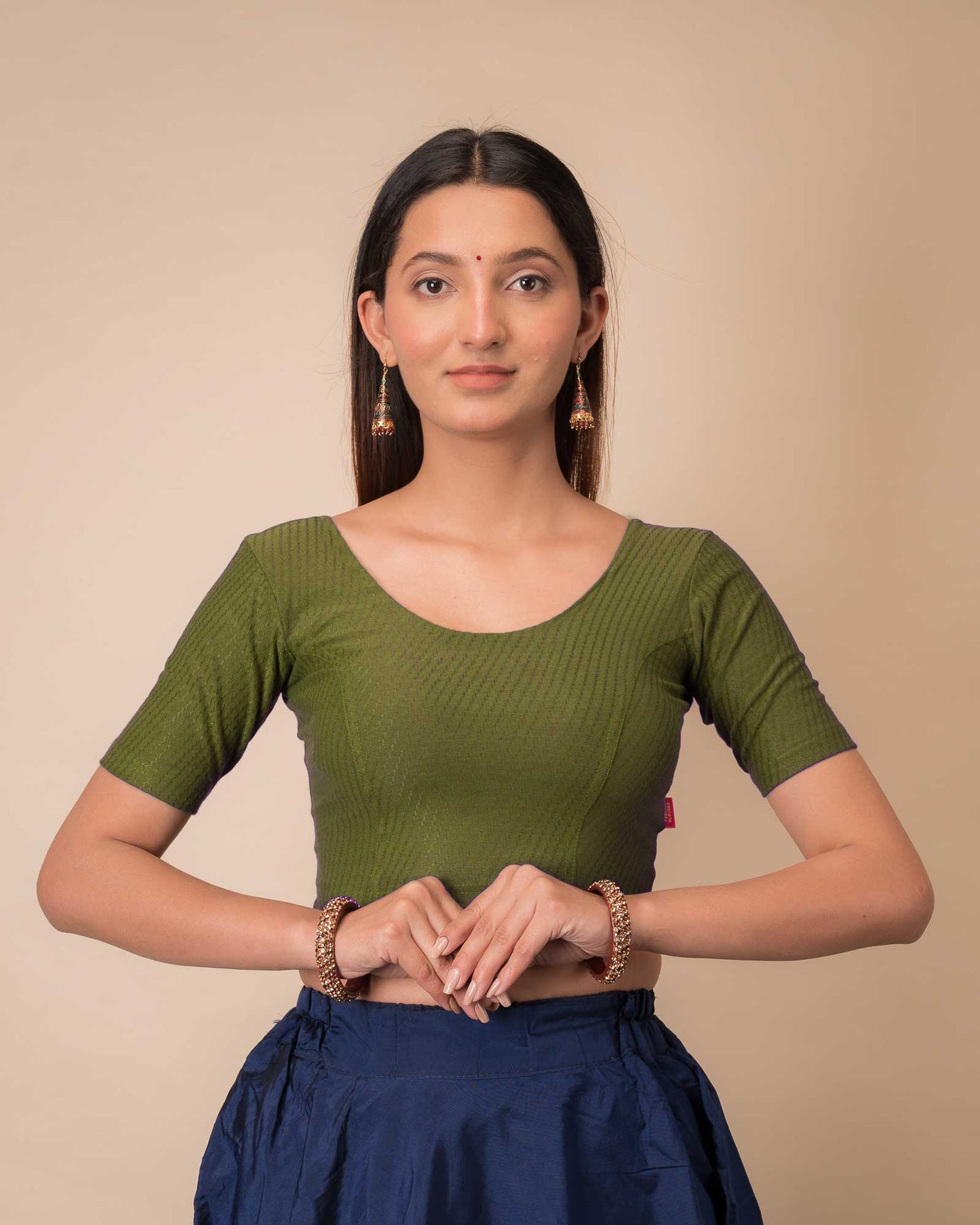 Side profile highlighting sleeve length and silhouette