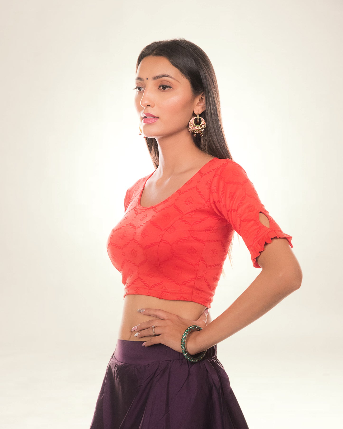 Amira Red Jacquard Blouse with Peekaboo Back and Boat Neck by Advi