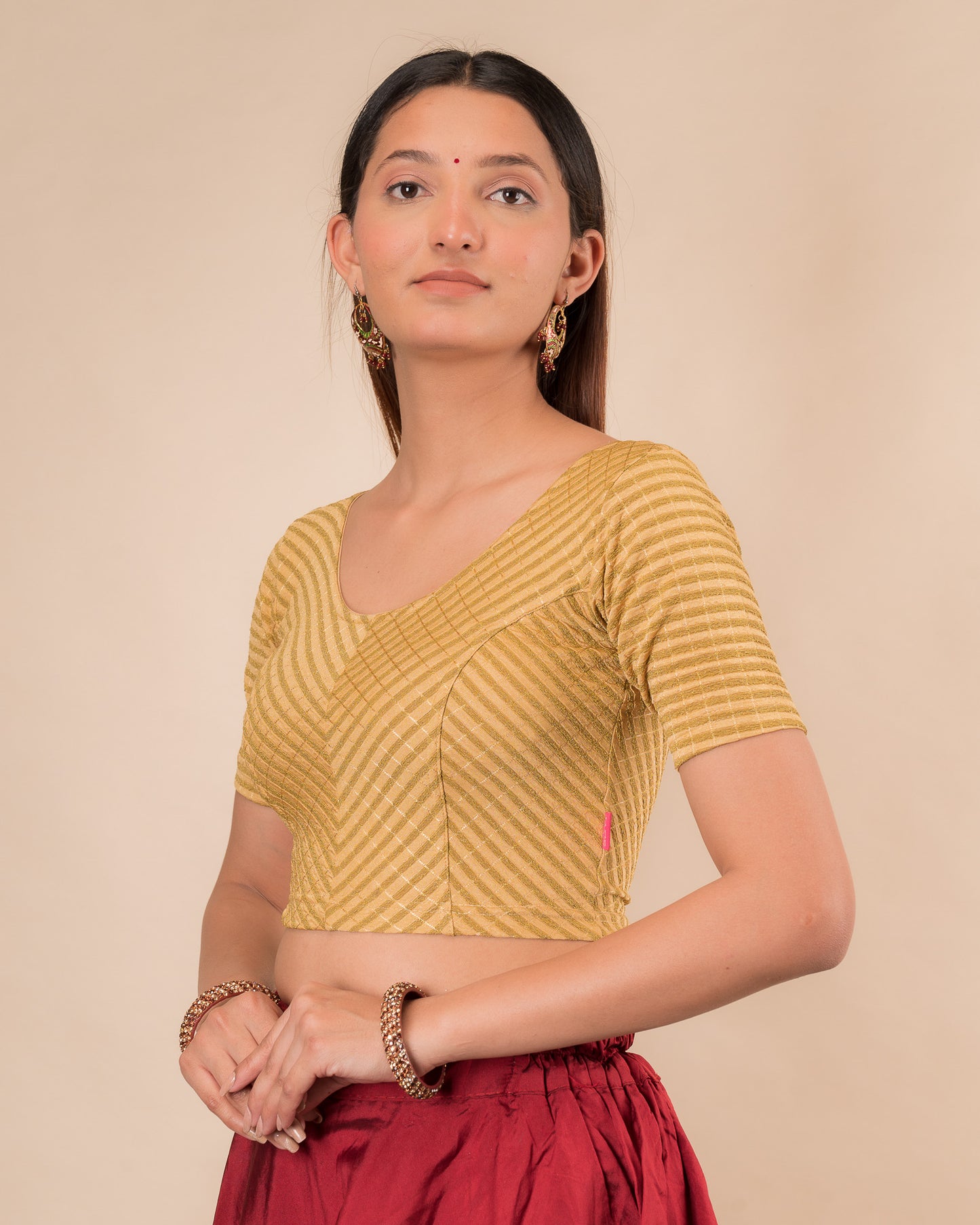 Side angle highlighting the sleeve length and overall silhouette