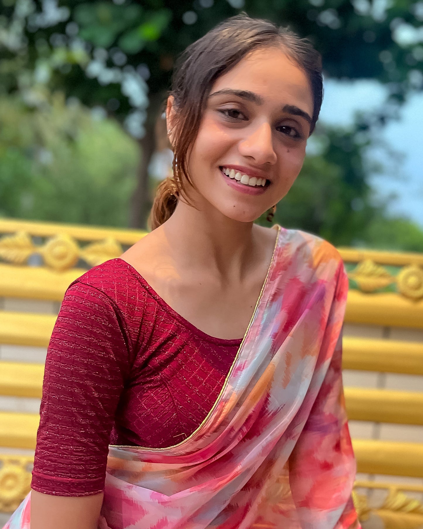 Model pairing the blouse with a saree for a bold, festive look