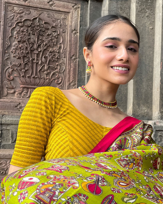 Model pairing the blouse with a saree for a bold, festive look