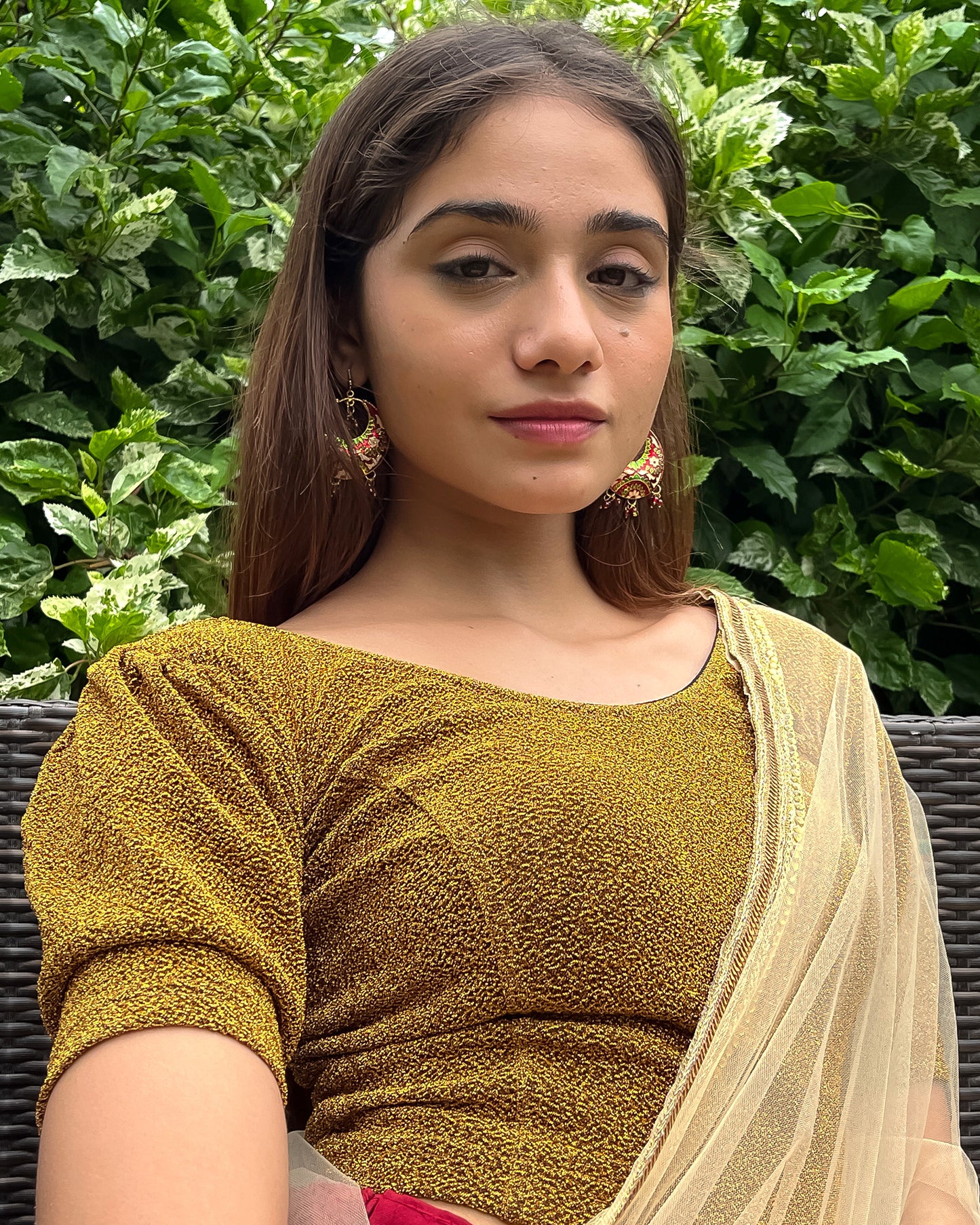 Model pairing the blouse with a saree for a polished festive ensemble