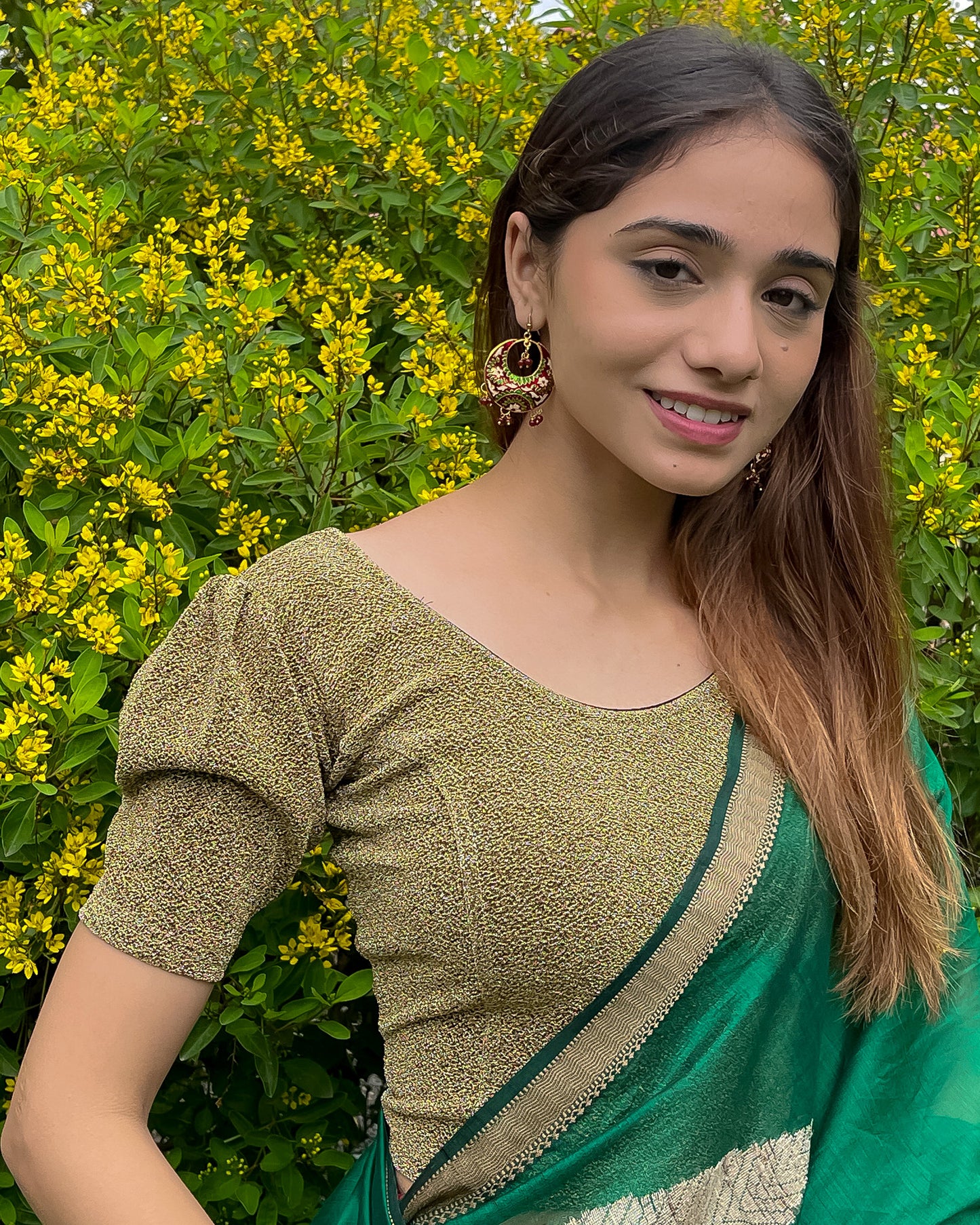 Model pairing the blouse with a saree for a polished festive ensemble