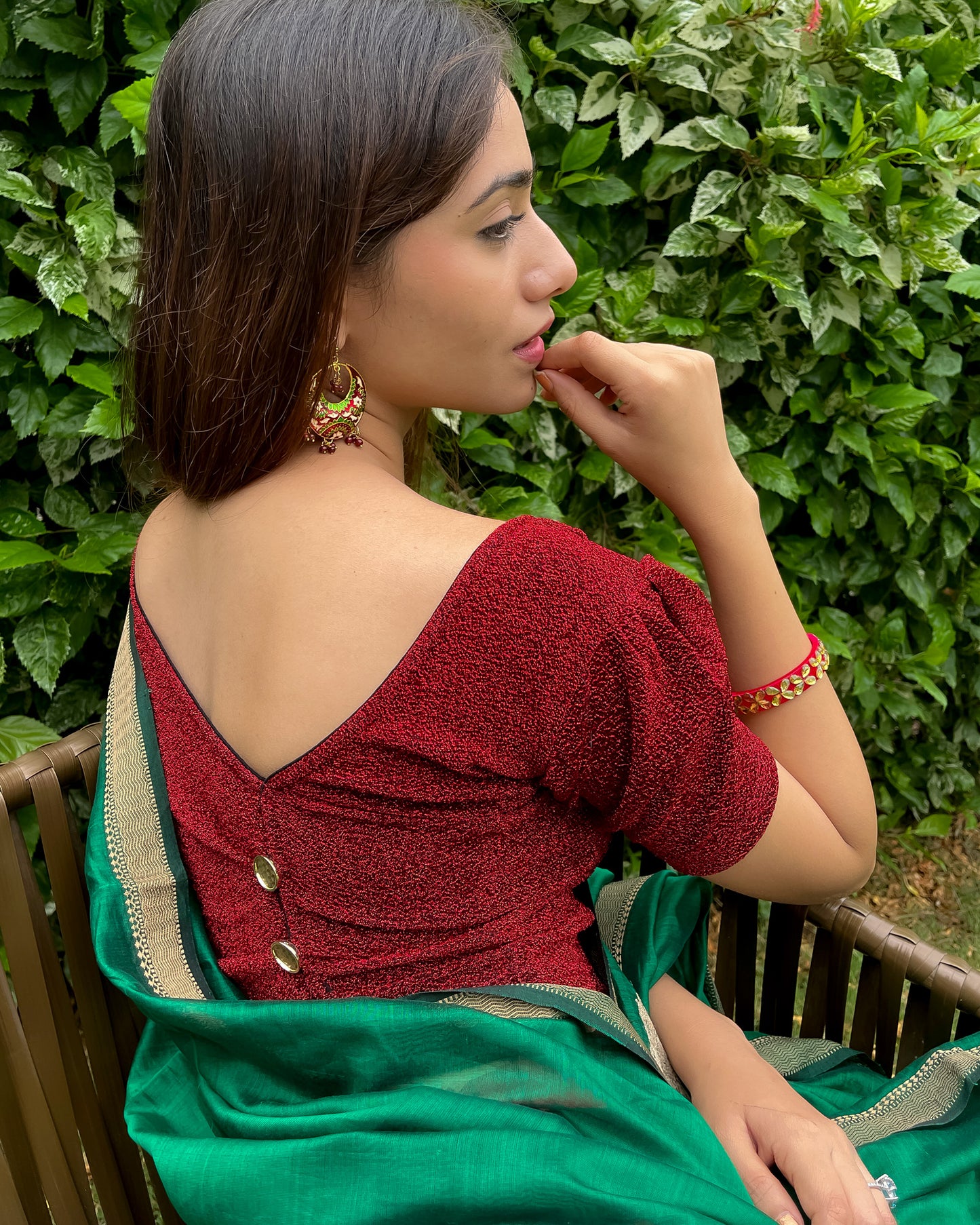 Model pairing the blouse with a saree for a polished festive ensemble