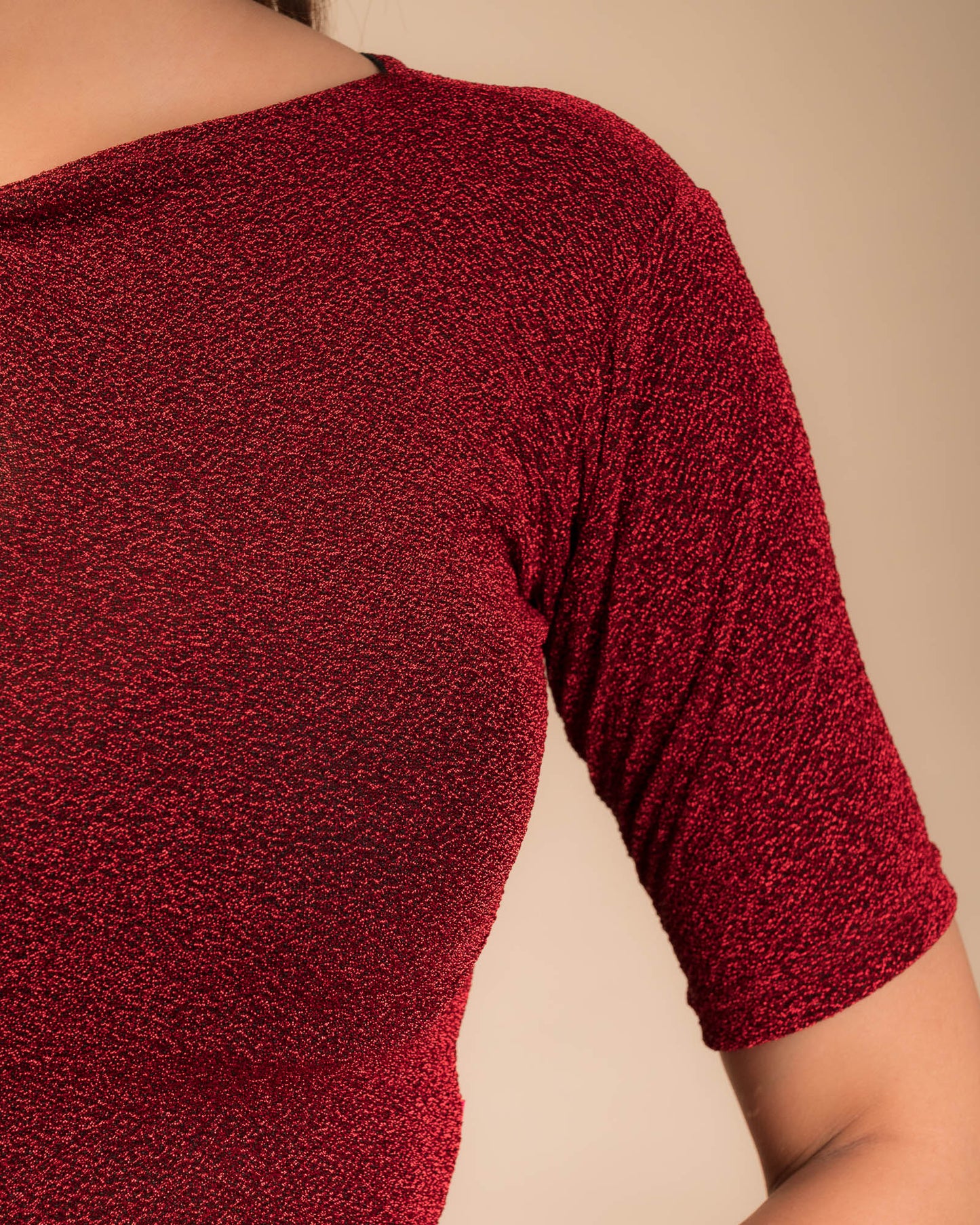 Close-up of the metallic knit texture and subtle zari lines.