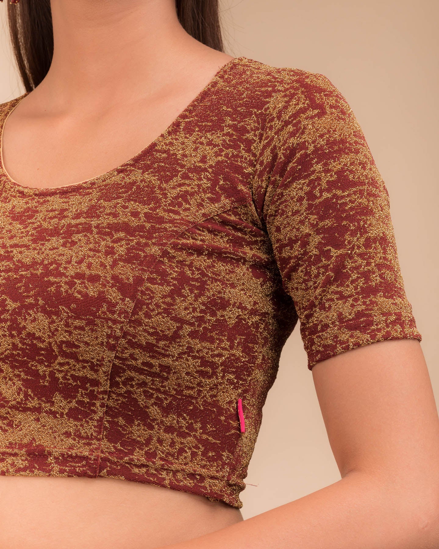 Close‑up of the metallic zari woven texture