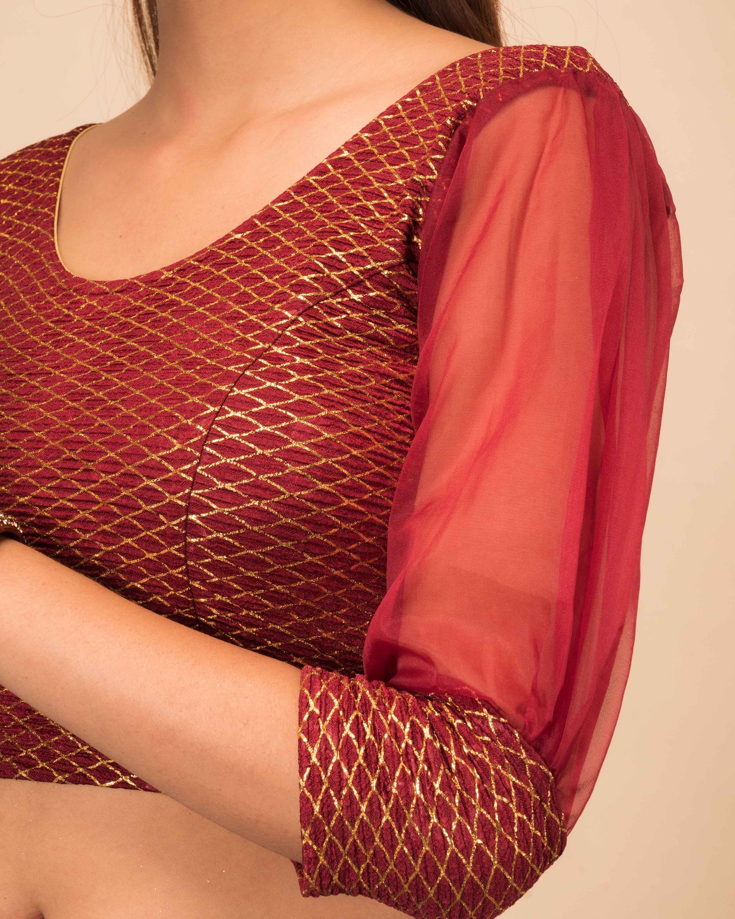 Close-up of the crushed organza material with gold check detailing