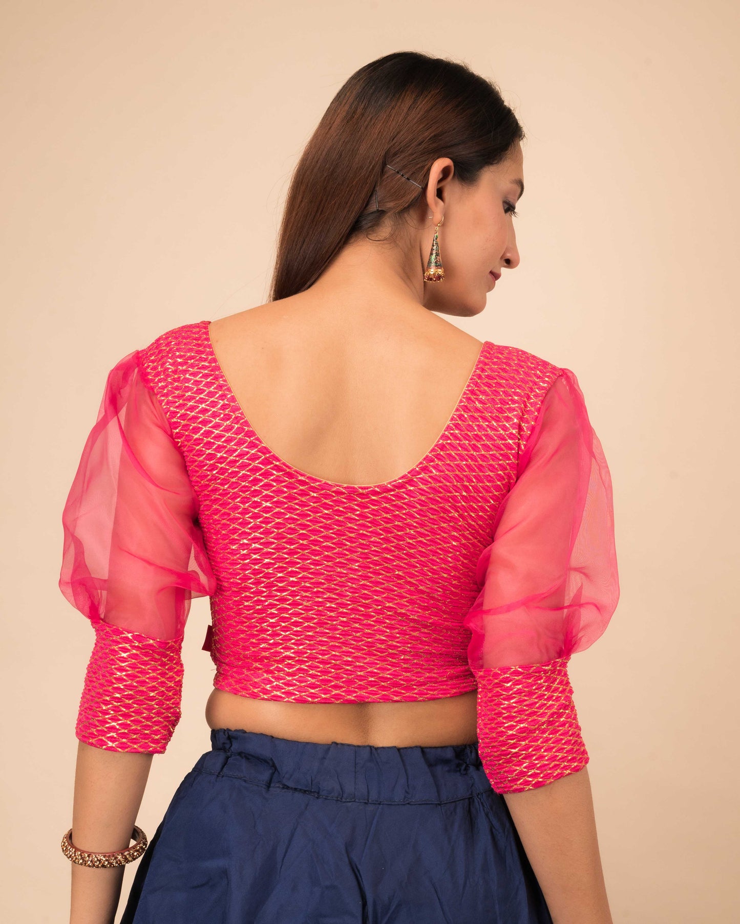Rear view showcasing the back fit and sleeve shape
