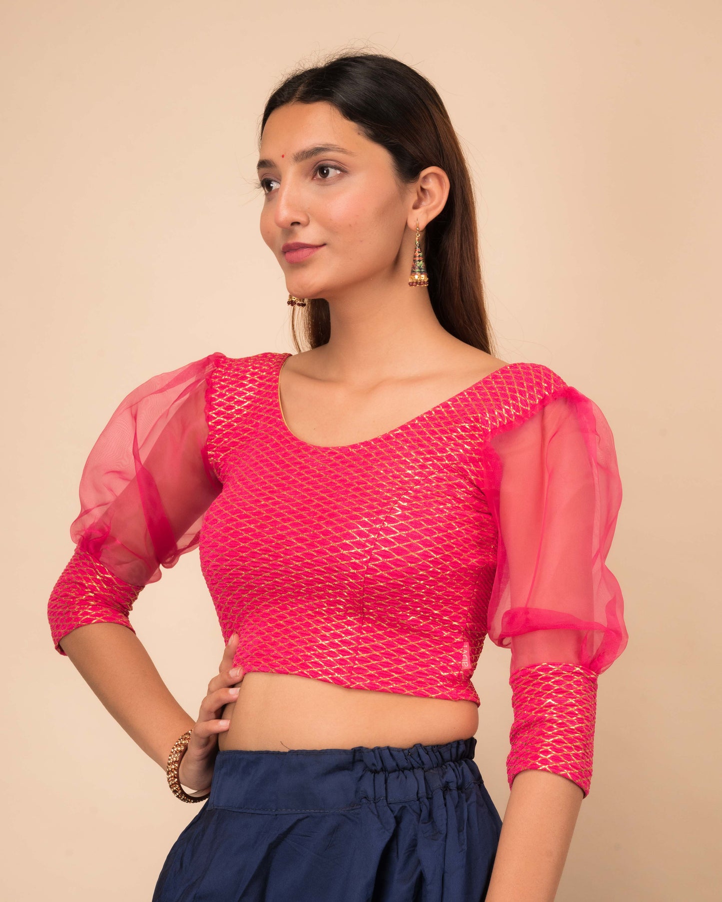 Side profile highlighting the puffed sleeves with cuffs