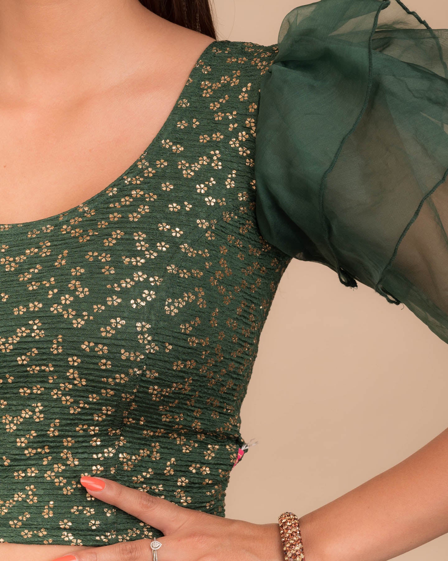 Close-up of the foil floral print on organza in lightweight stretch texture