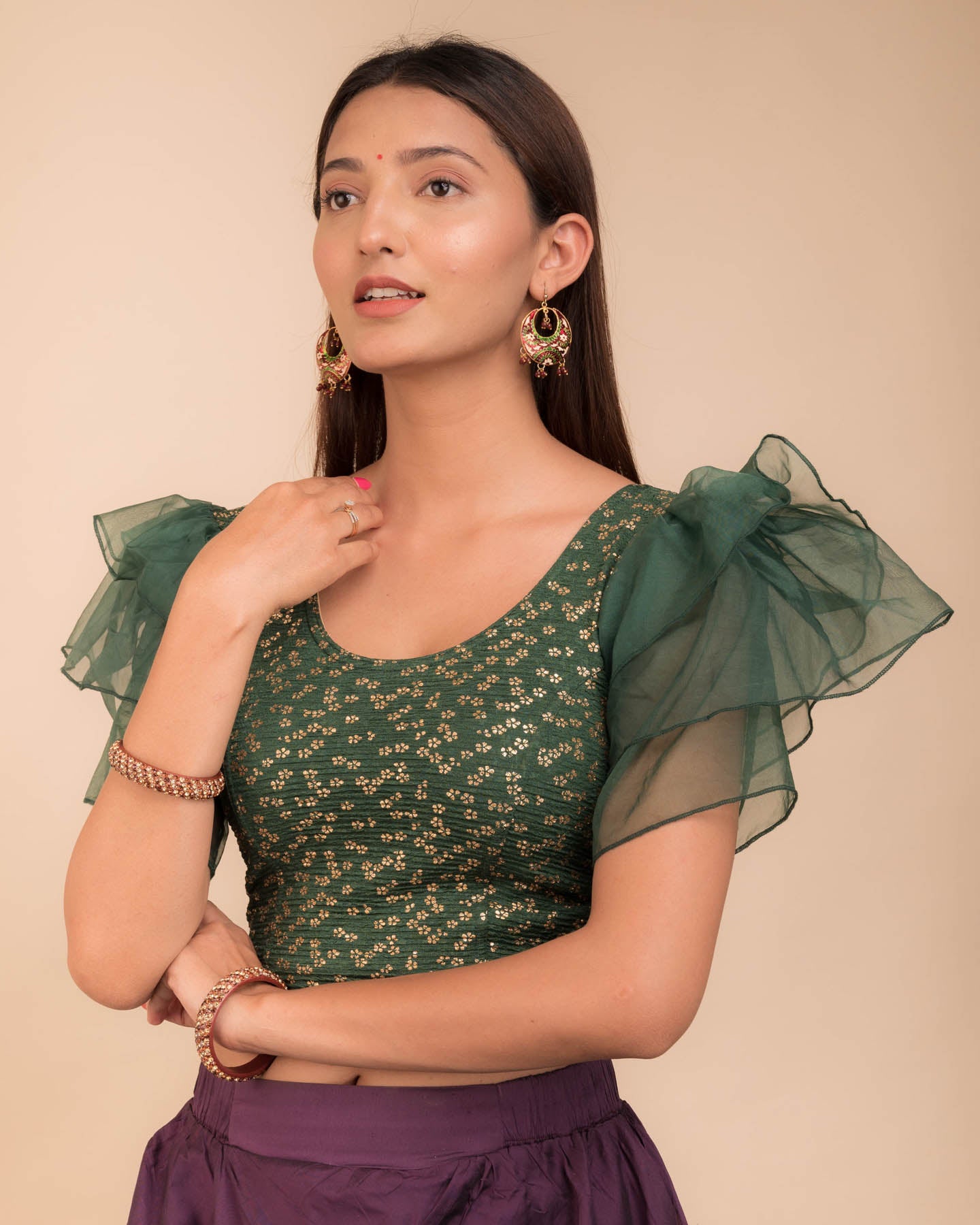 Side angle highlighting the sleeve depth and fit silhouette