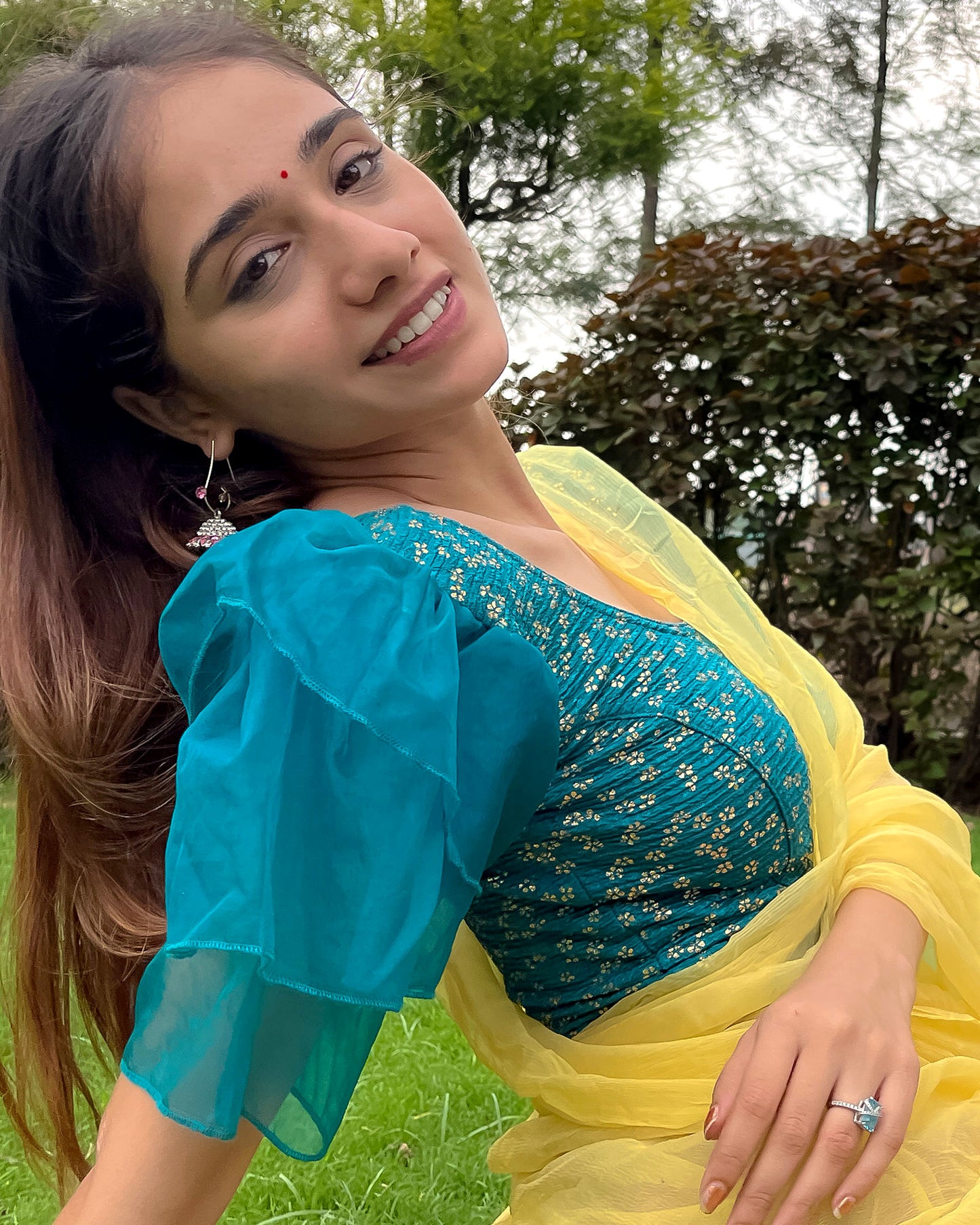 Model pairing the blouse with a saree for a festive, elegant look