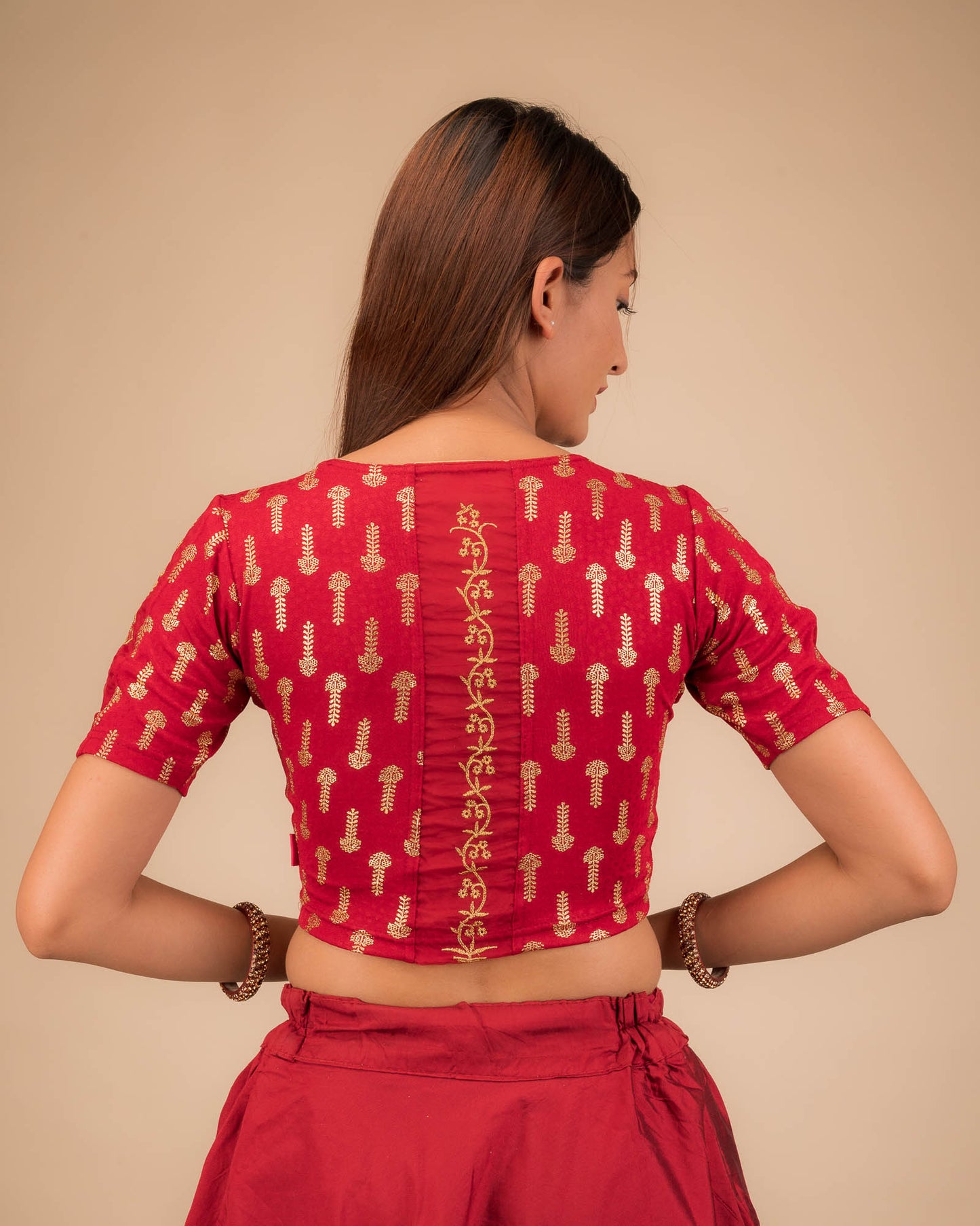 Rear view showcasing the embroidered zig-zag pattern across the back.