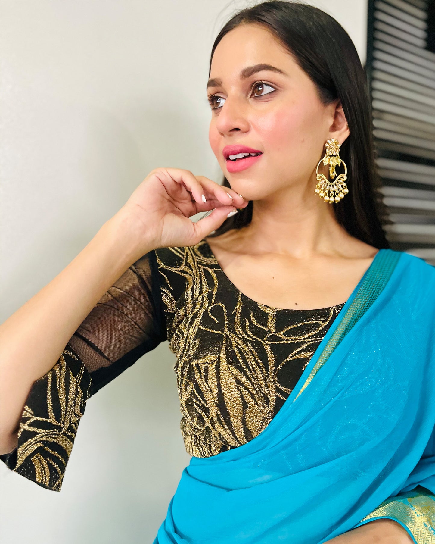 Model pairing the blouse with a saree for an elegant festive ensemble