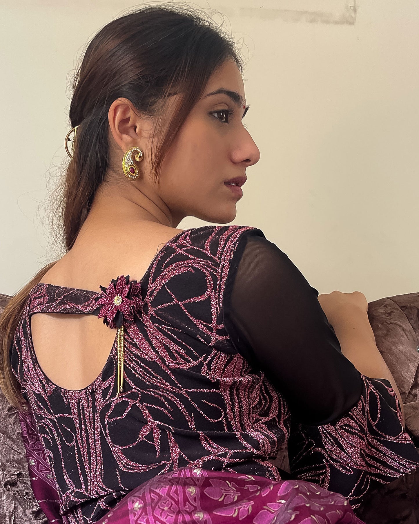 Model pairing the blouse with a saree for an elegant festive ensemble