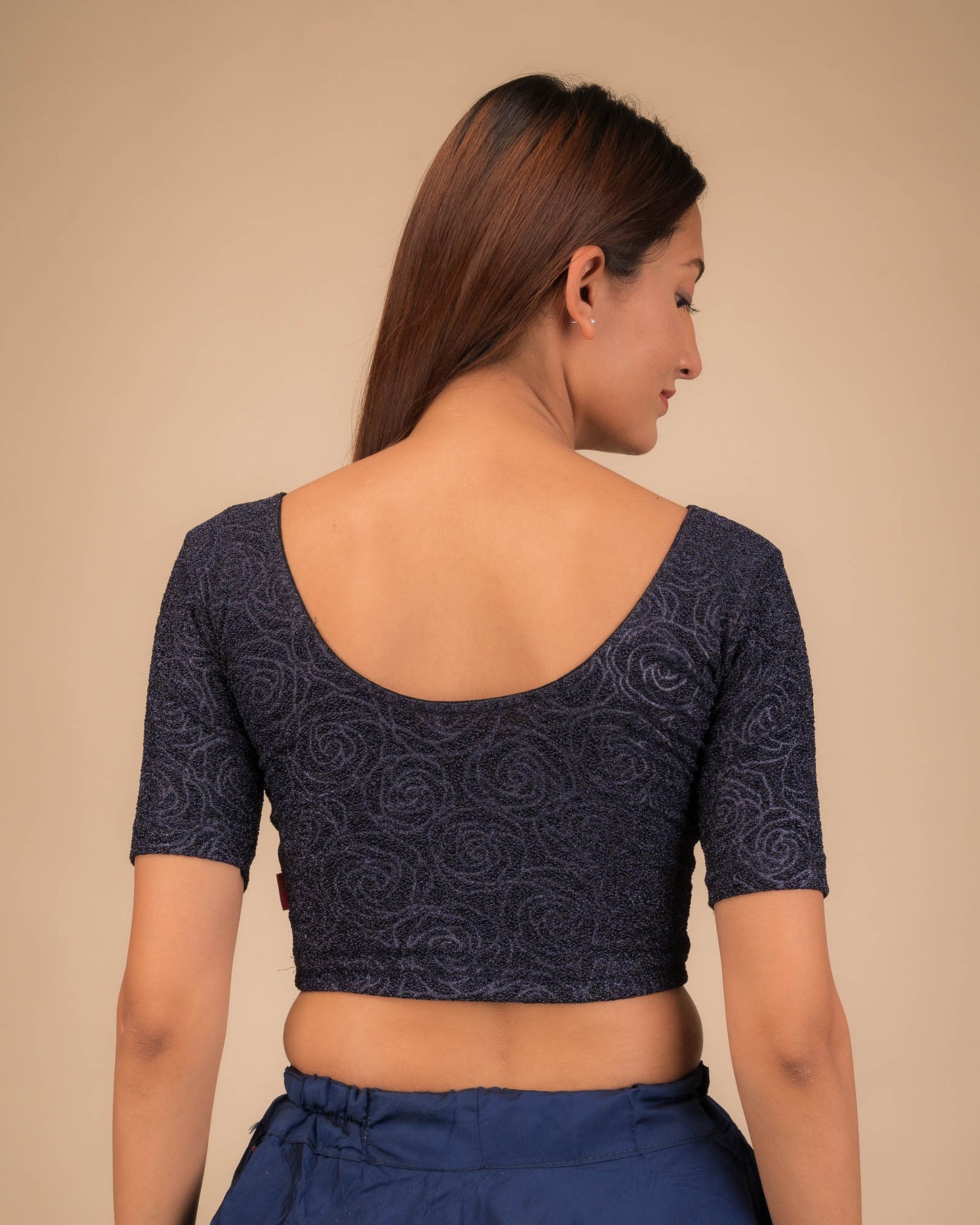 Rear view of the stretchable blouse showcasing the back design.
