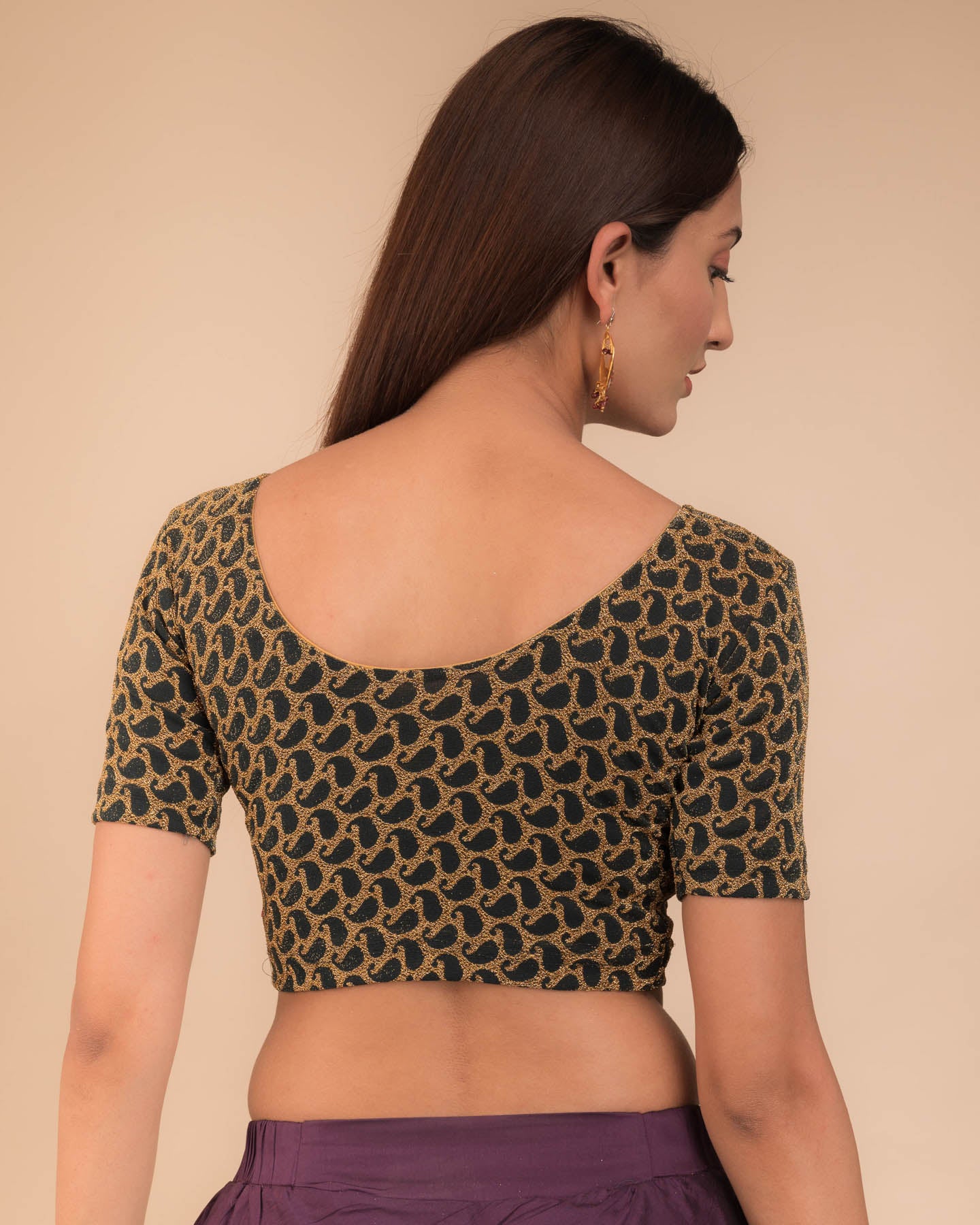 Rear view of the blouse showcasing the back design.
