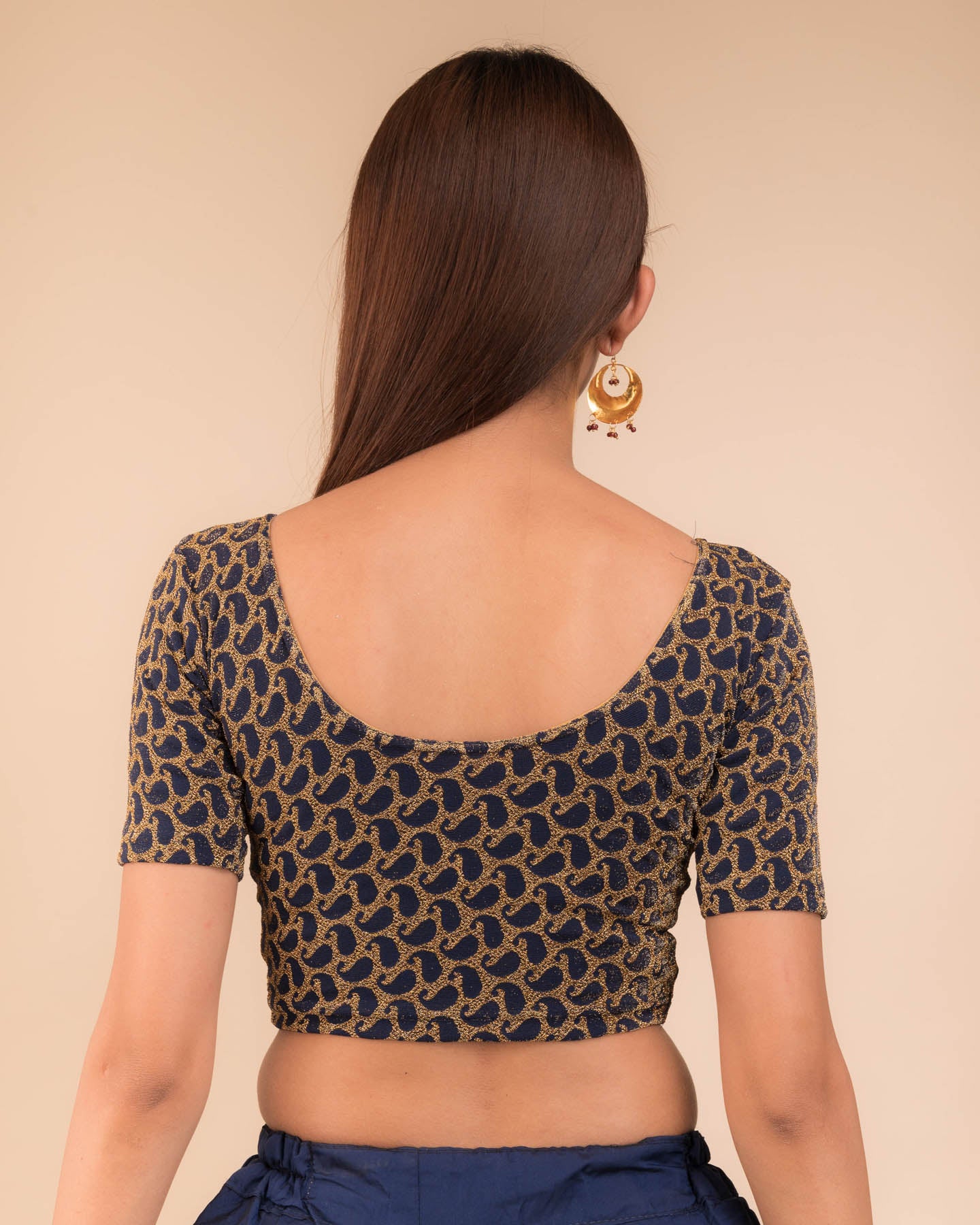 Rear view of the blouse showcasing the back design.