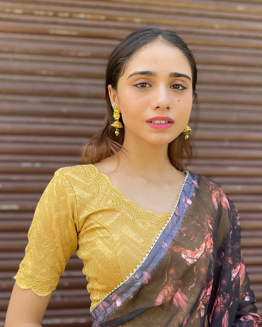 Model pairing the blouse with a saree for a festive-ready look.