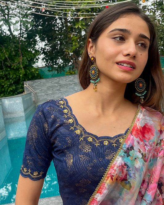 Model pairing the blouse with a saree for a festive-ready look.