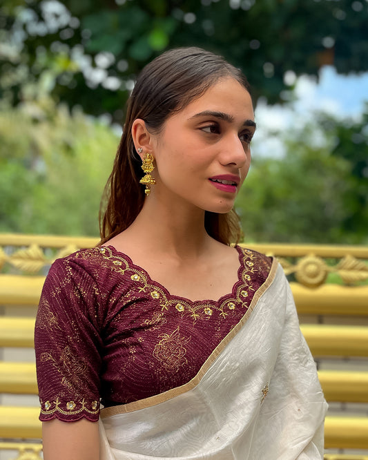 Model pairing the blouse with a saree for a festive-ready look.