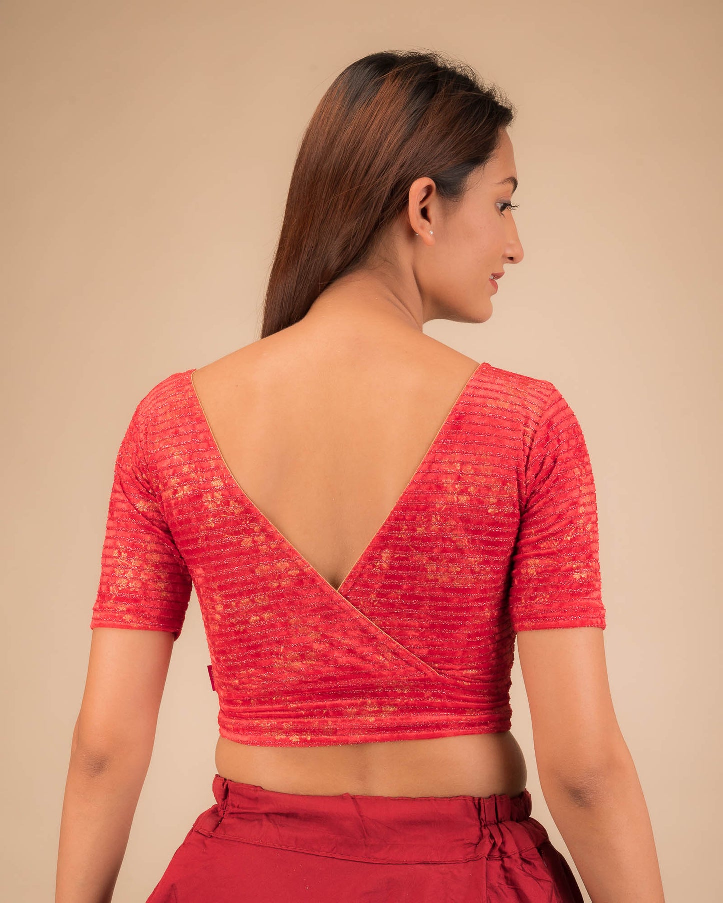 Rear view showing the V-shaped overlap back detail.