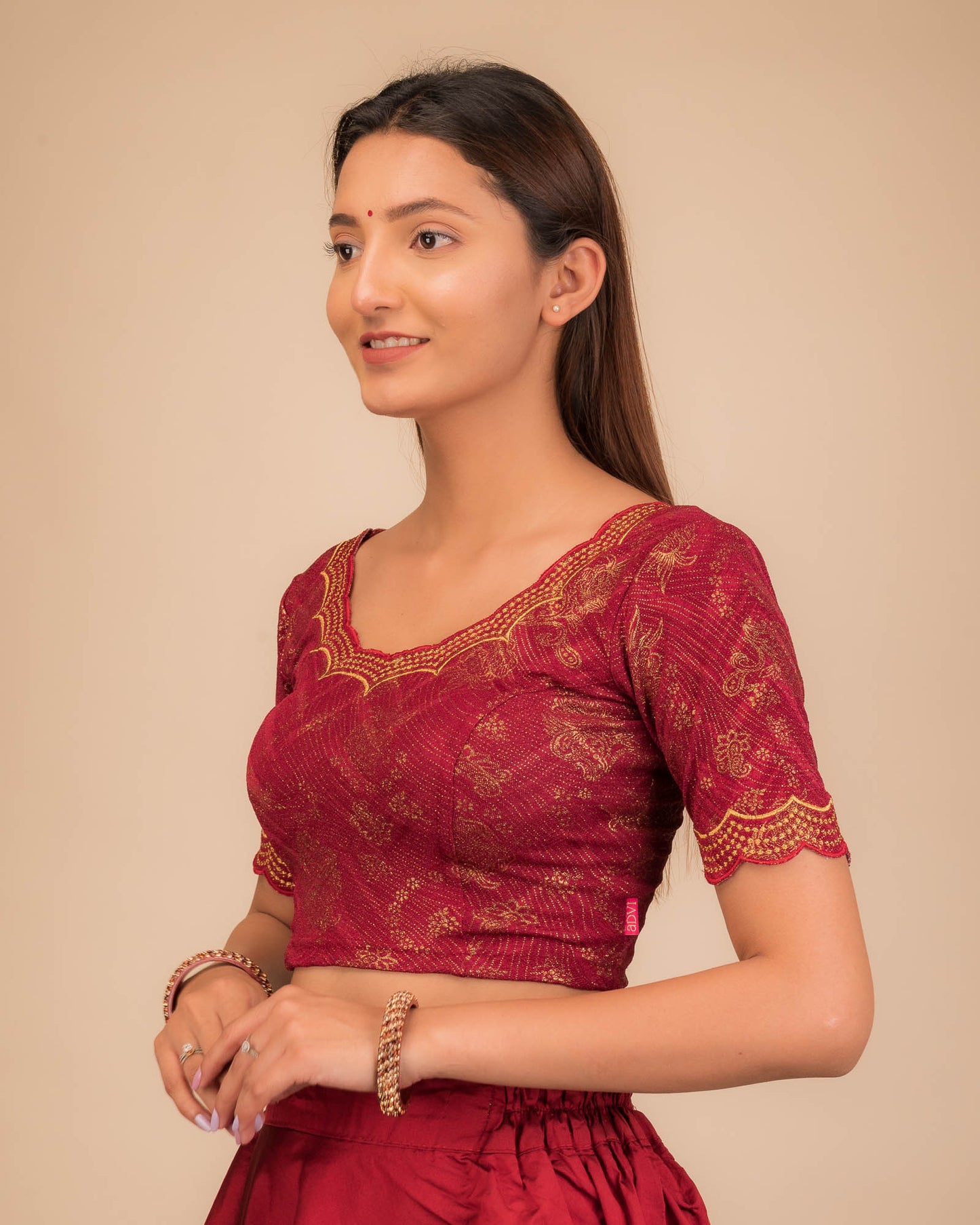 Side profile highlighting fit and sleeve length.