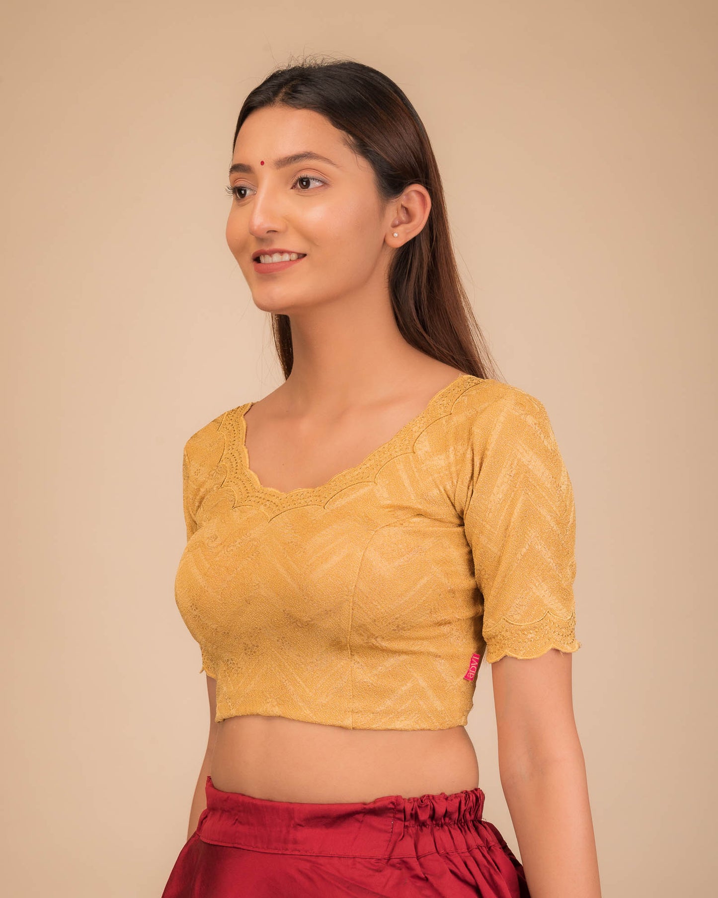 Side profile highlighting fit and sleeve length.