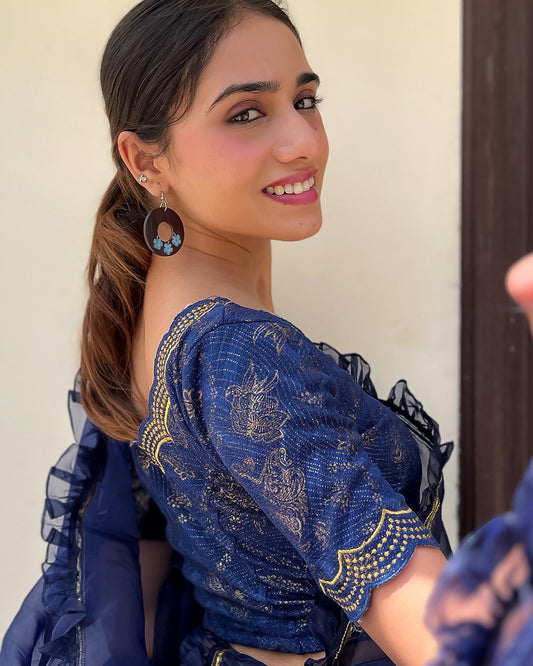 Model paired with a saree for a festive-ready look.