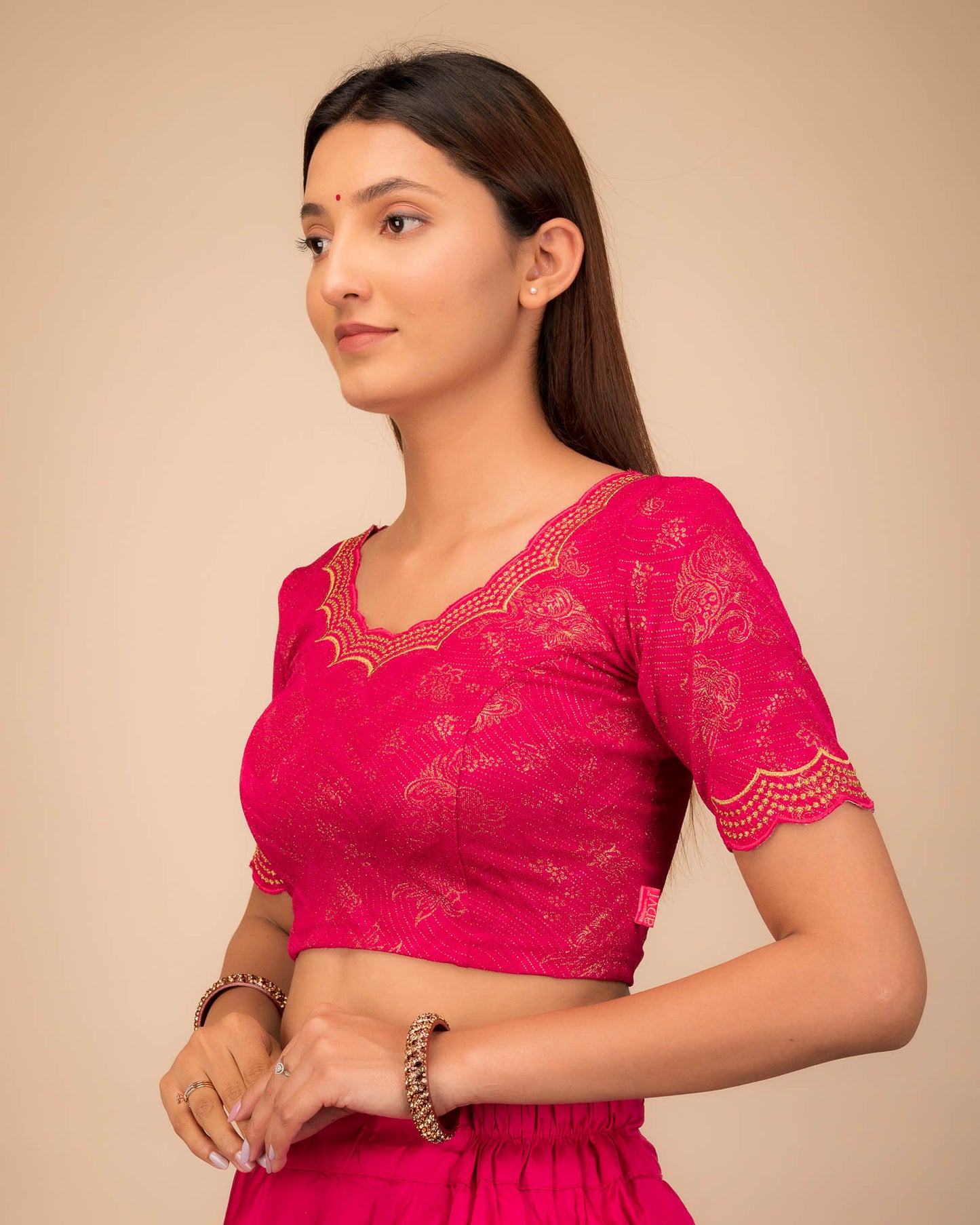 Side profile highlighting fit and sleeve length.
