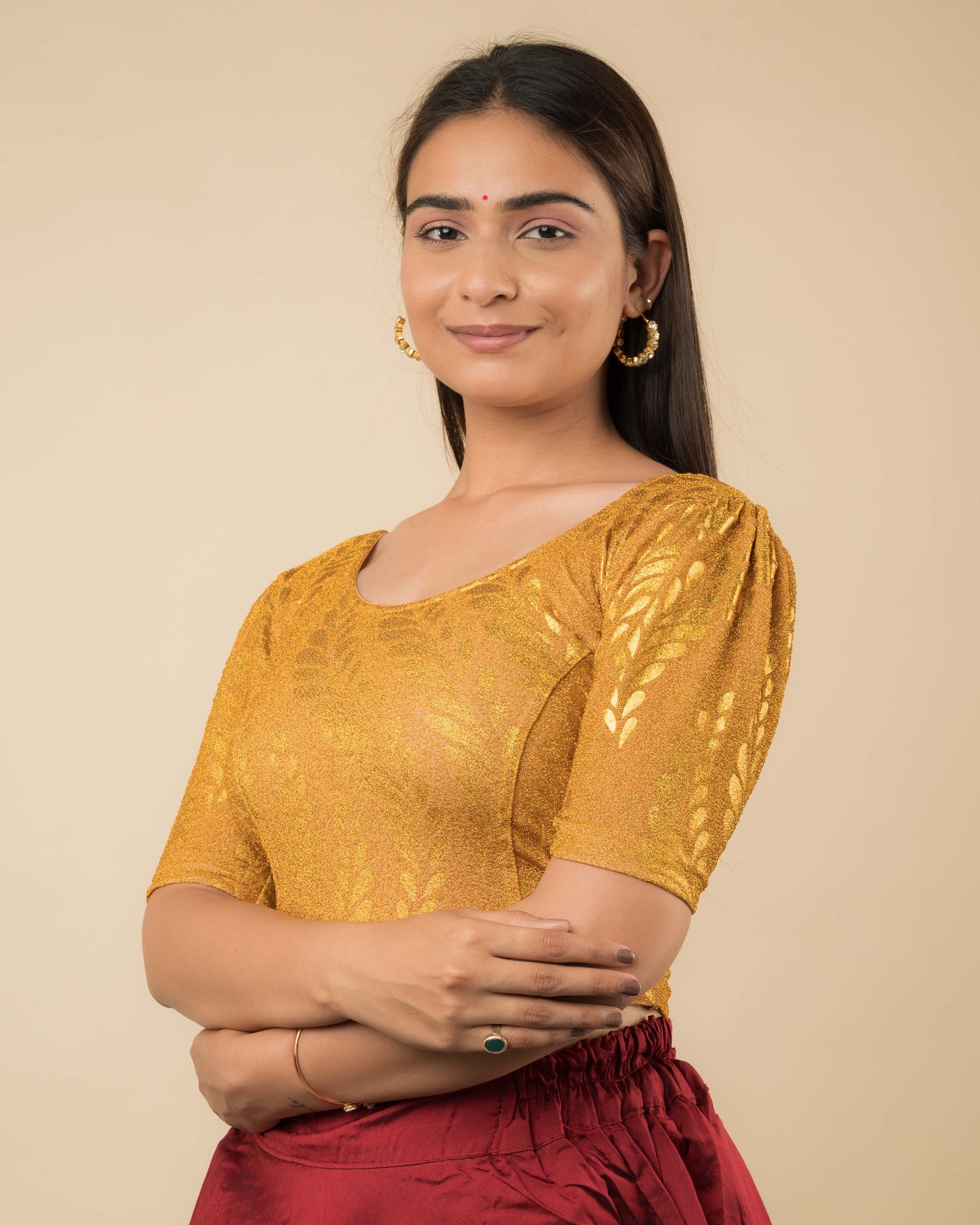 Side profile of metallic zari stretchable blouse highlighting fit, rose print design, and sleeve structure.