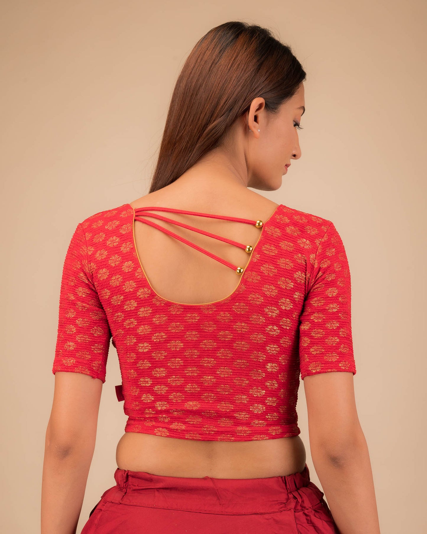 Rear view showcasing pearl accents at the back.
