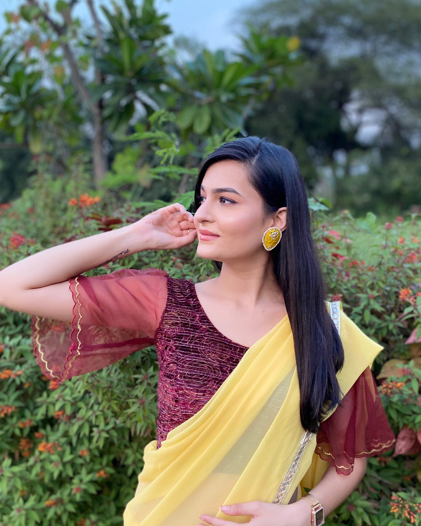 Model pairing the blouse with a saree, demonstrating a festive-ready look.
