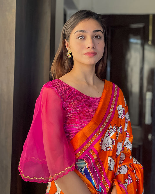 Model pairing the blouse with a saree, demonstrating a festive-ready look.