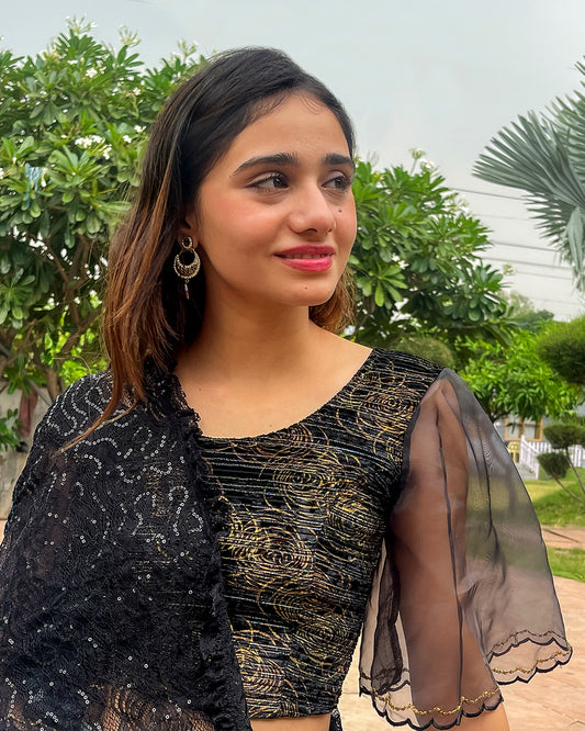 Model pairing the blouse with a saree, demonstrating a festive-ready look.