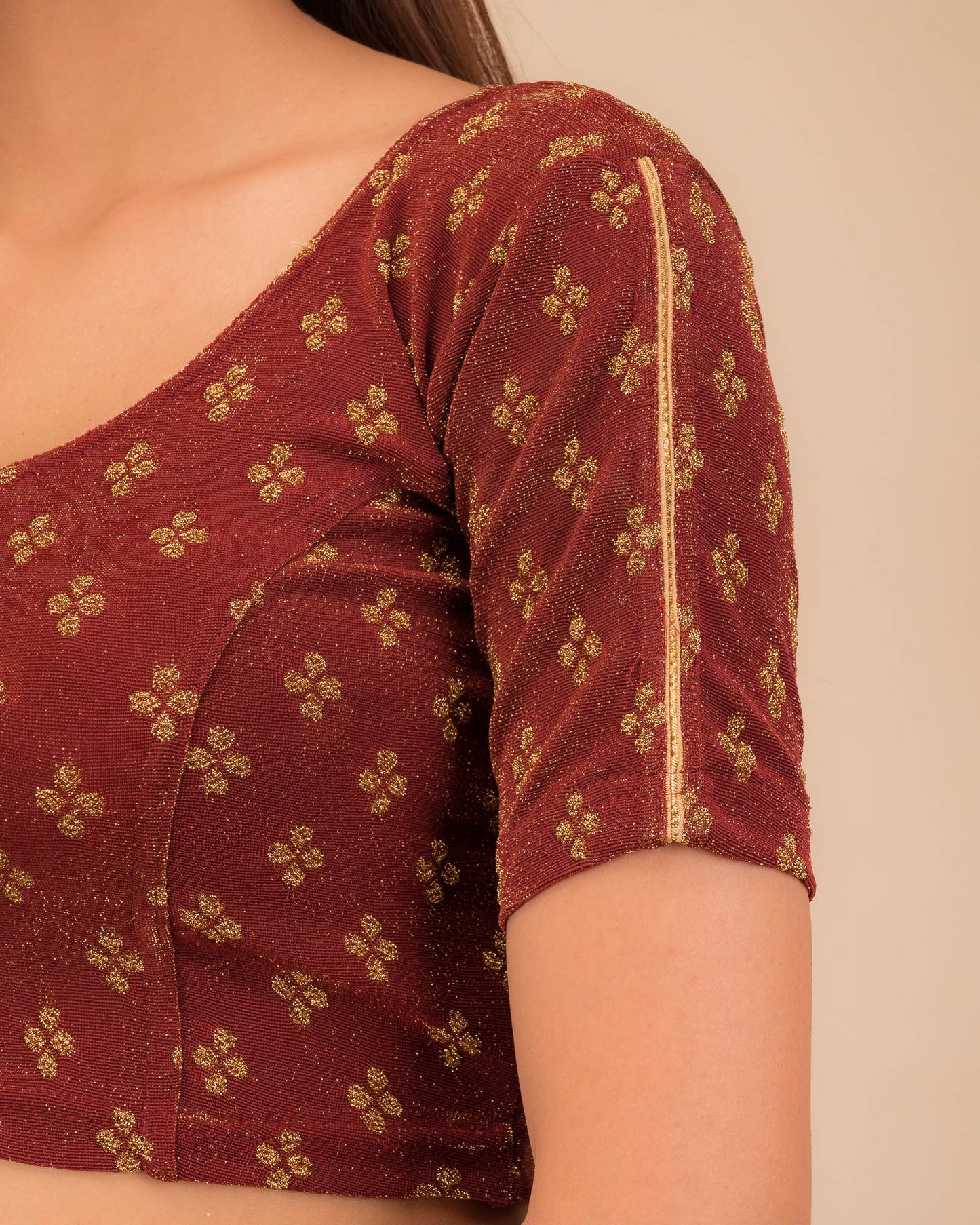 Close-up of jacquard fabric and motif detailing.