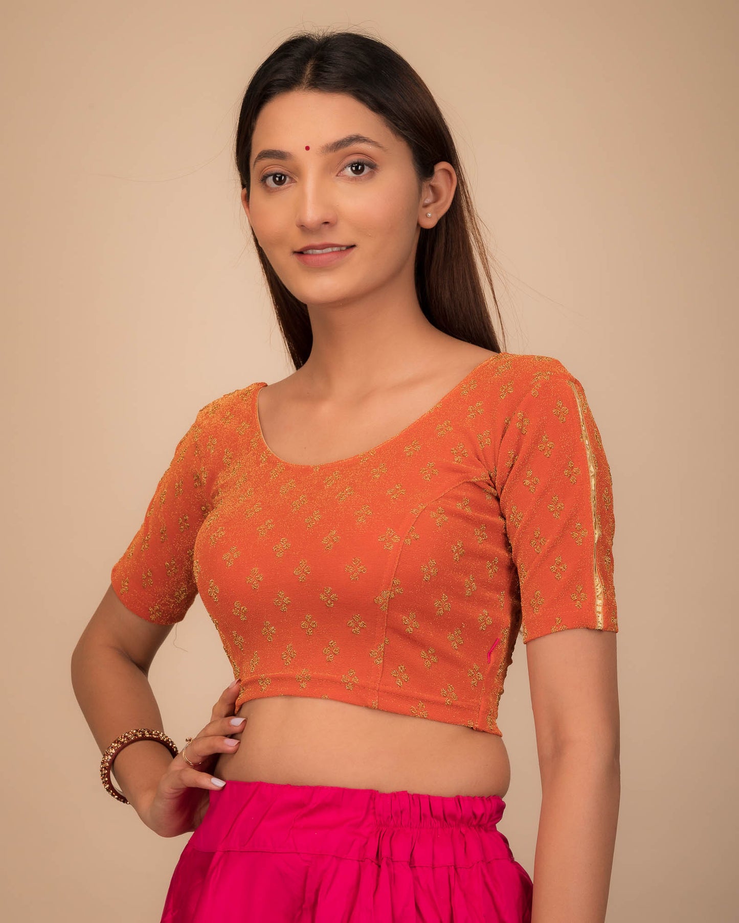 Side profile emphasizing the blouse’s fit and sleeve structure.