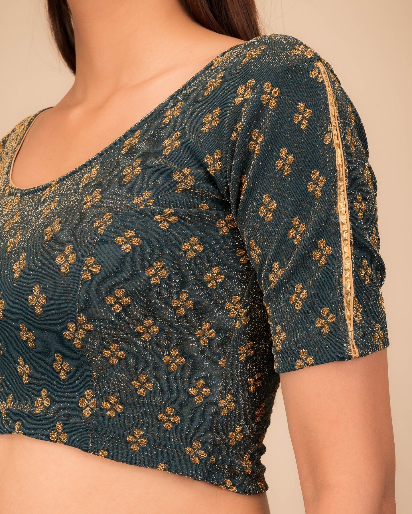 Close-up of jacquard fabric and motif detailing.