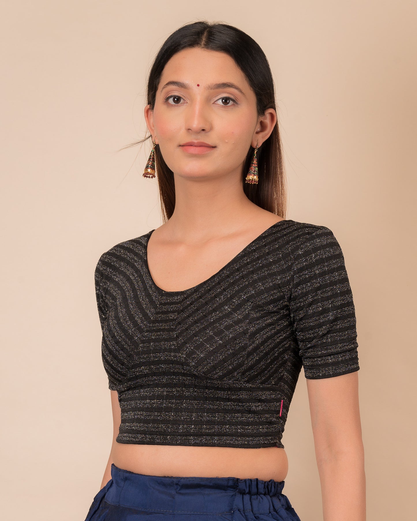 Side profile of the zari stripe stretchable blouse highlighting the fit and sleeve length