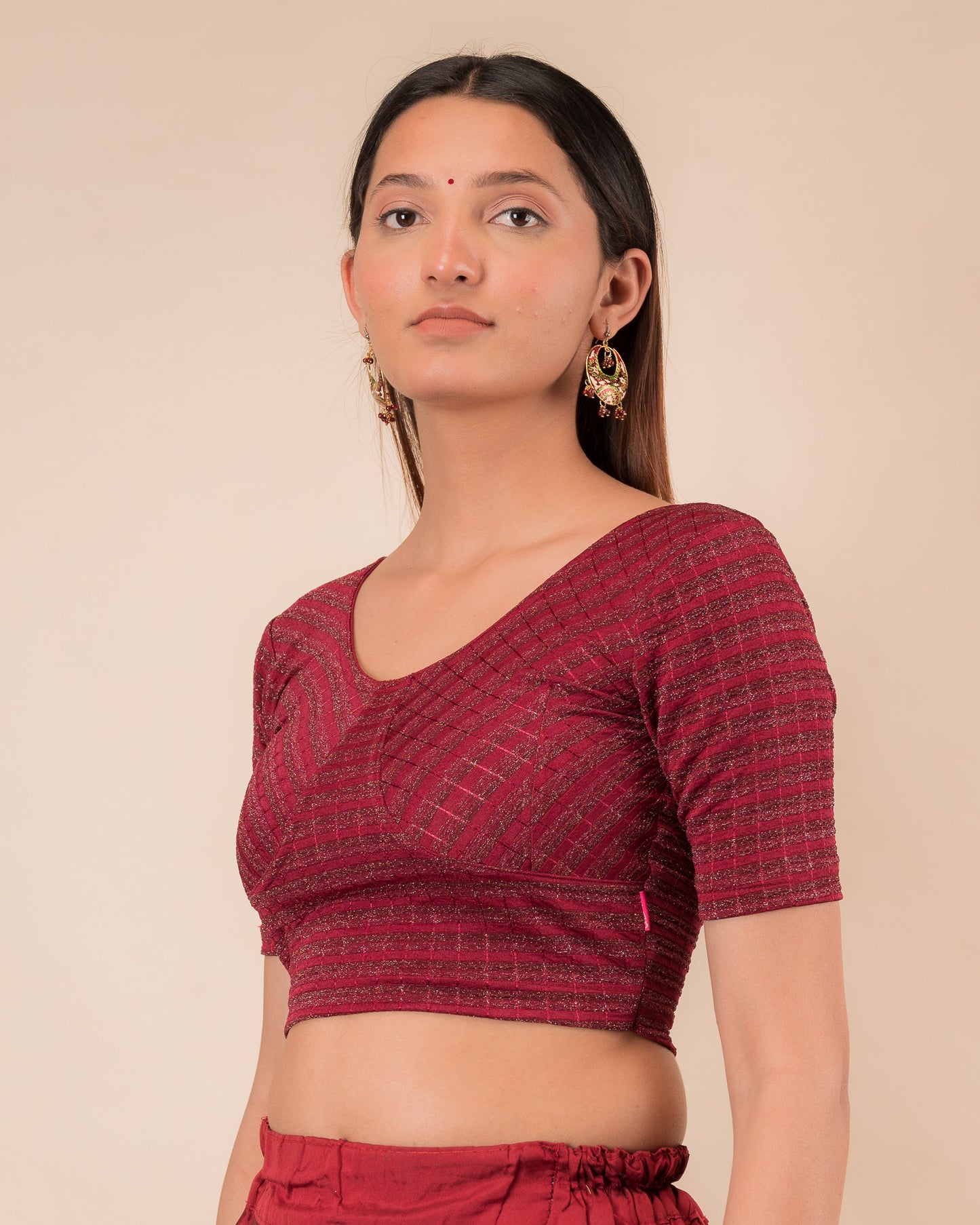 Side profile of the zari stripe stretchable blouse highlighting the fit and sleeve length
