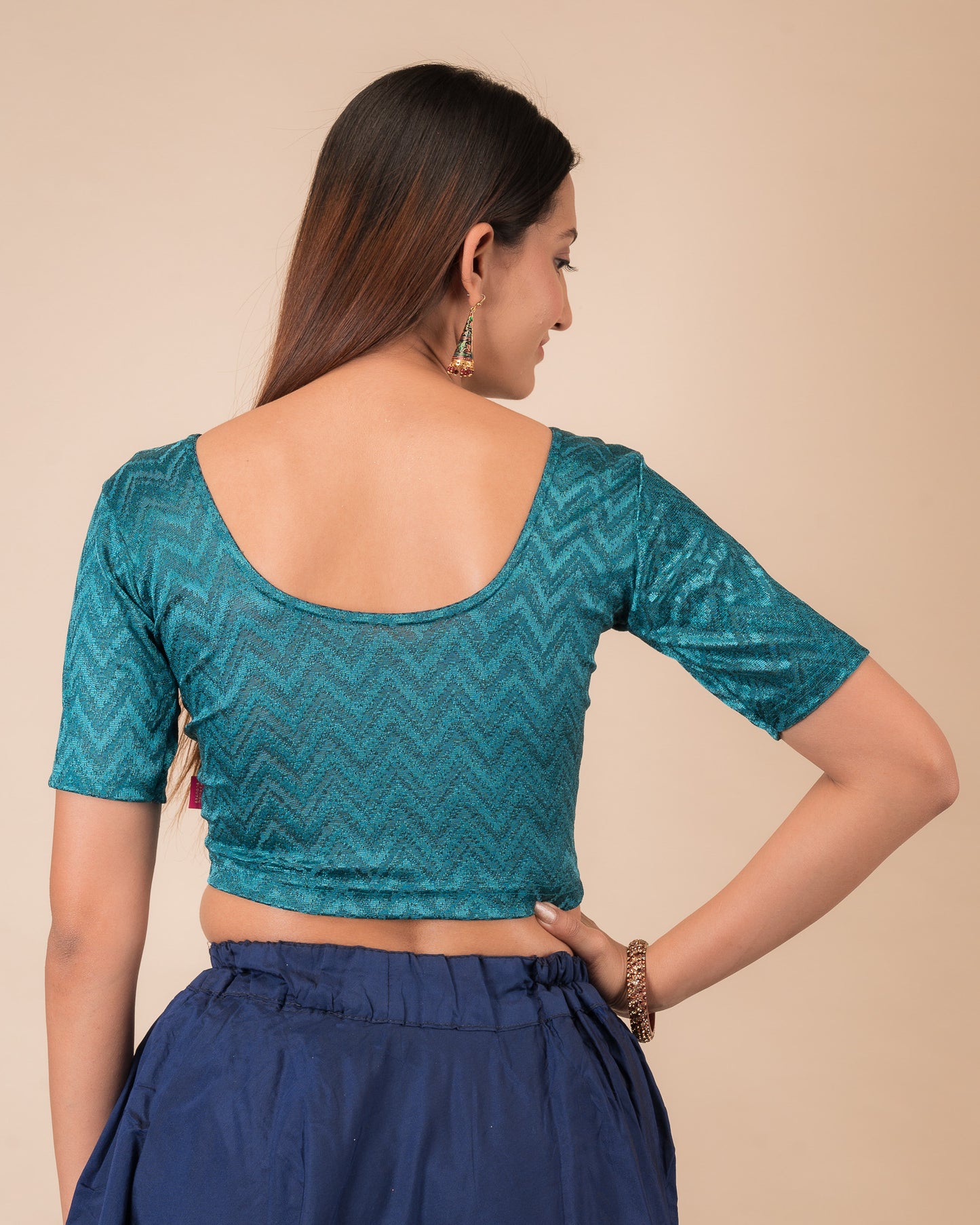 Rear view of the maroon melange zig-zag blouse showcasing the back design