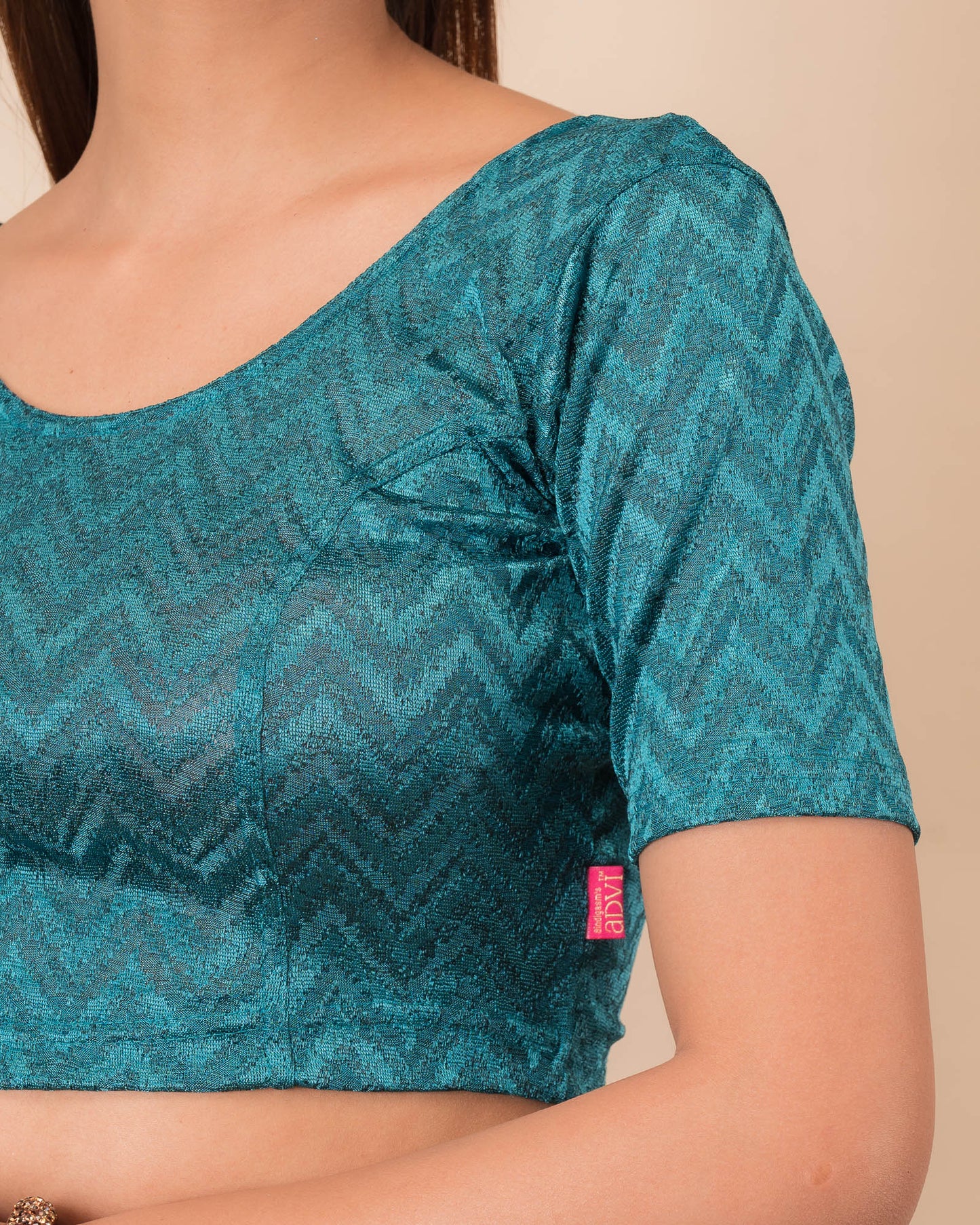 Close-up of the melange jacquard fabric detailing the zig-zag pattern and texture