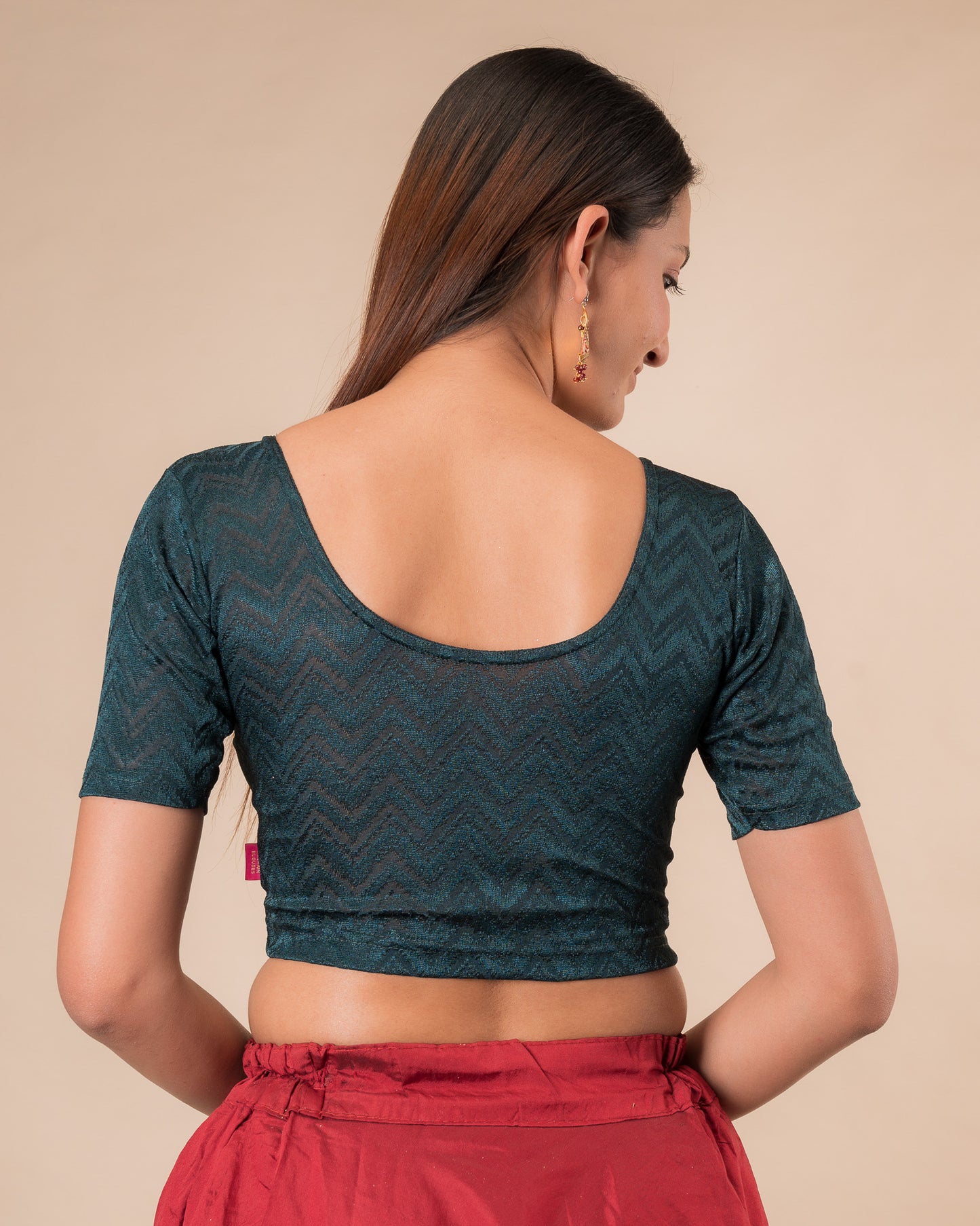 Rear view of the maroon melange zig-zag blouse showcasing the back design