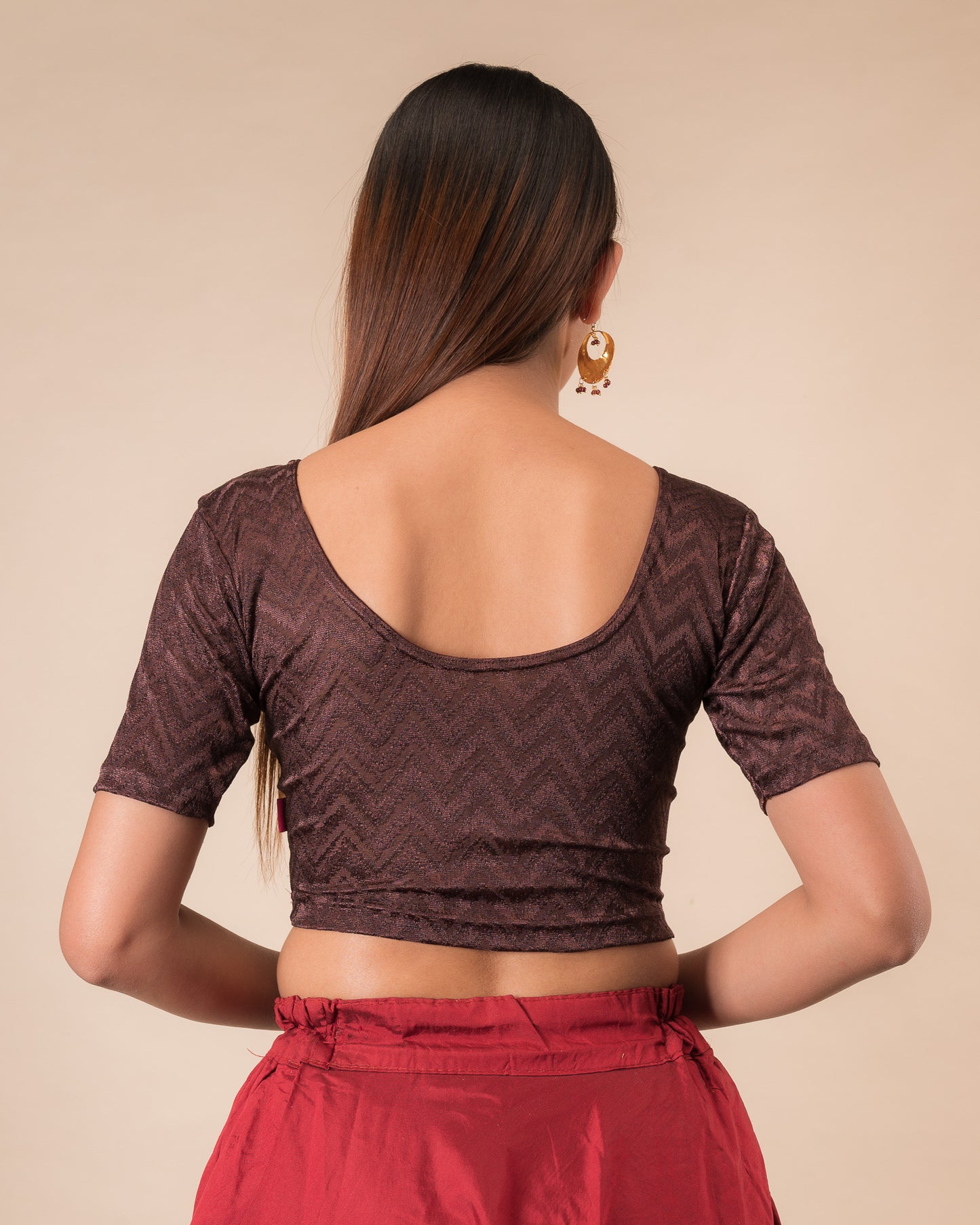 Rear view of the maroon melange zig-zag blouse showcasing the back design