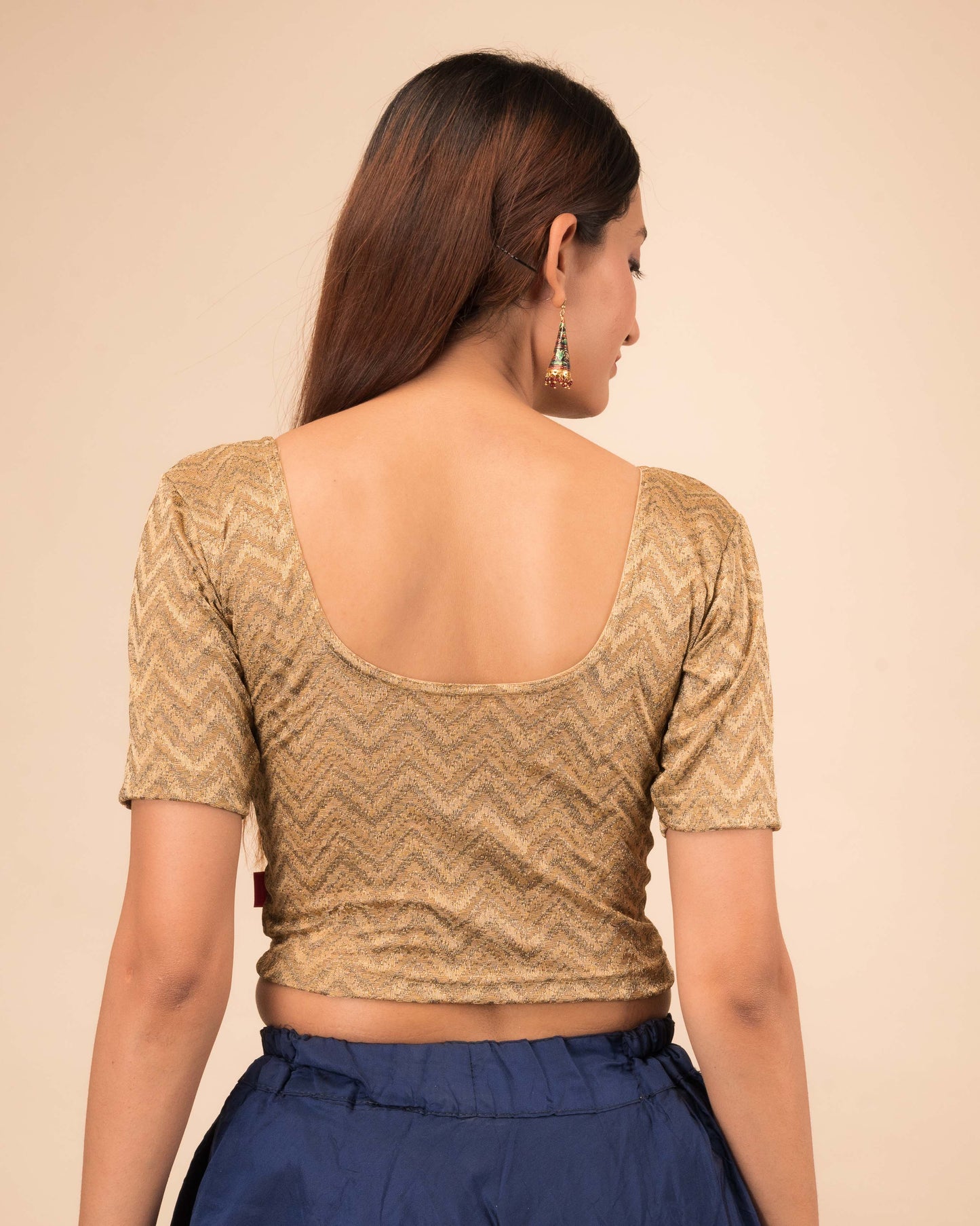 Rear view of the maroon melange zig-zag blouse showcasing the back design