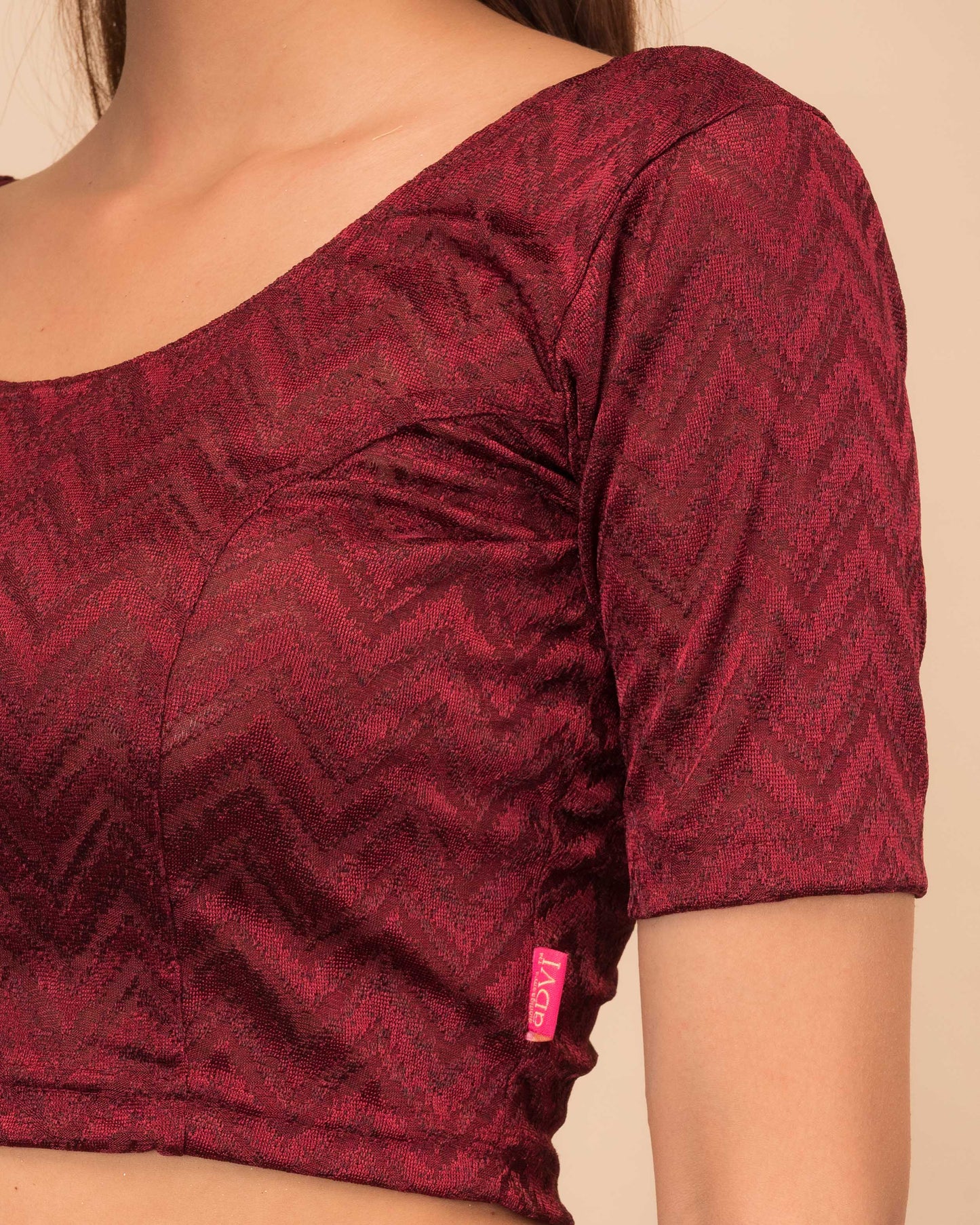 Close-up of the melange jacquard fabric detailing the zig-zag pattern and texture