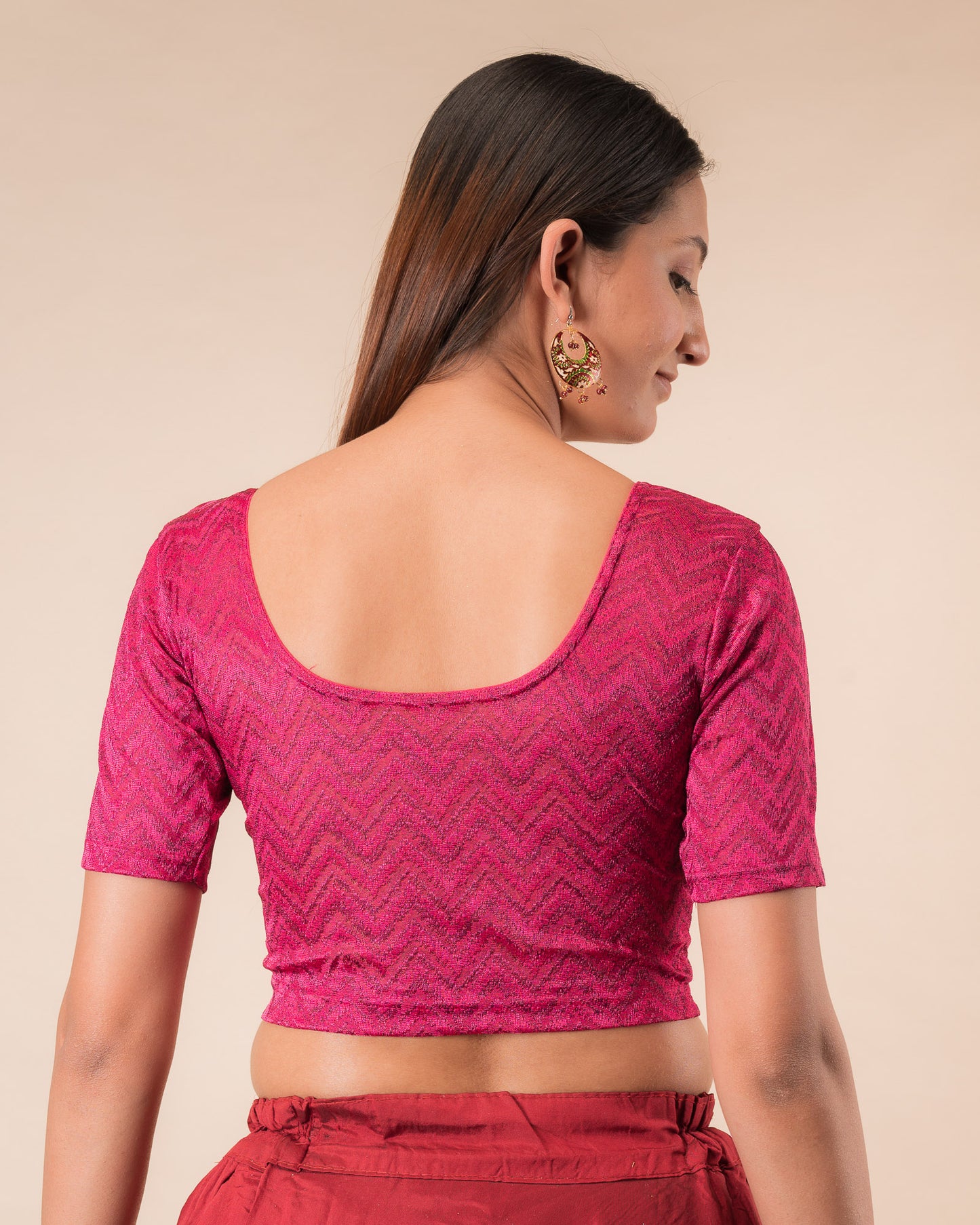 Rear view of the maroon melange zig-zag blouse showcasing the back design