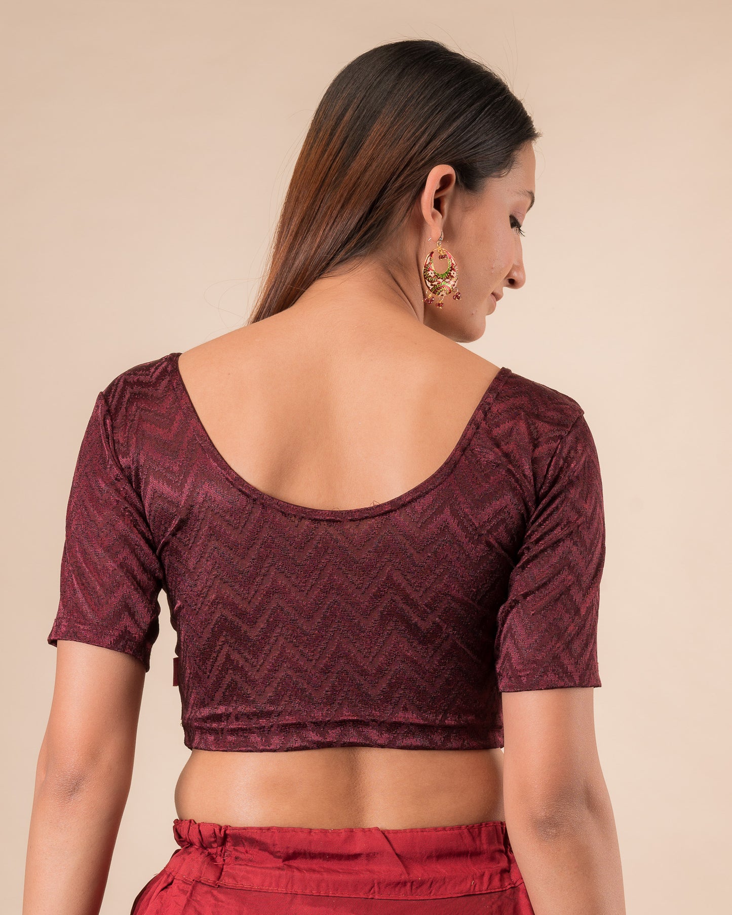 Rear view of the maroon melange zig-zag blouse showcasing the back design