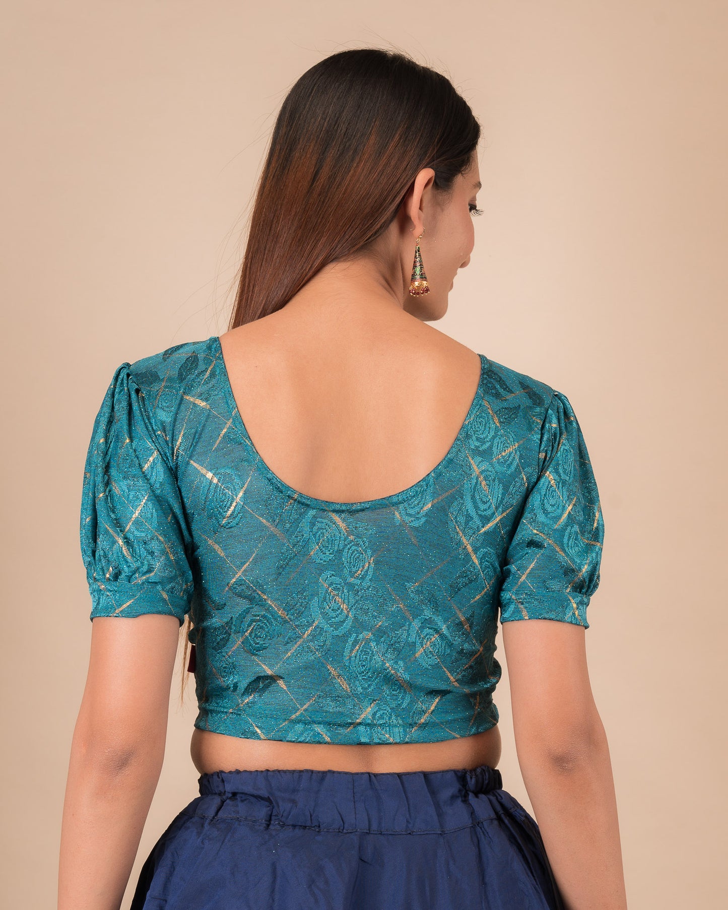Rear view of the grey melange stretchable blouse showcasing the back design